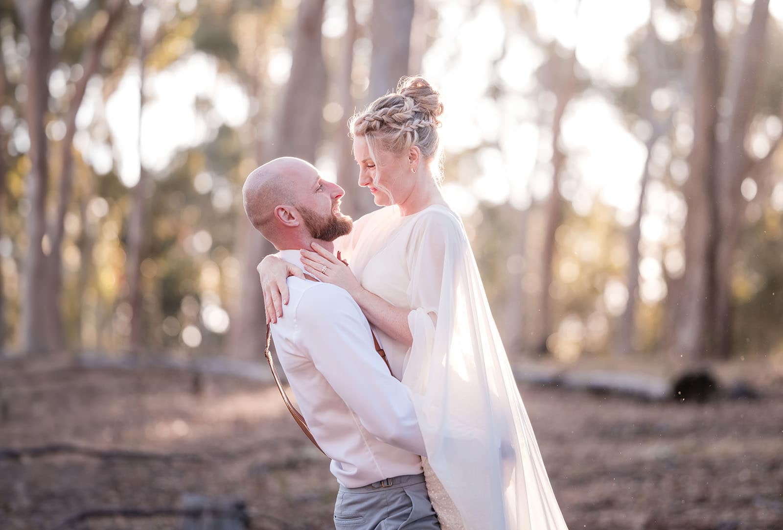 belair national park engagement shoot - lindsey & jaden 15 Couple Embracing in Sunlit Woods