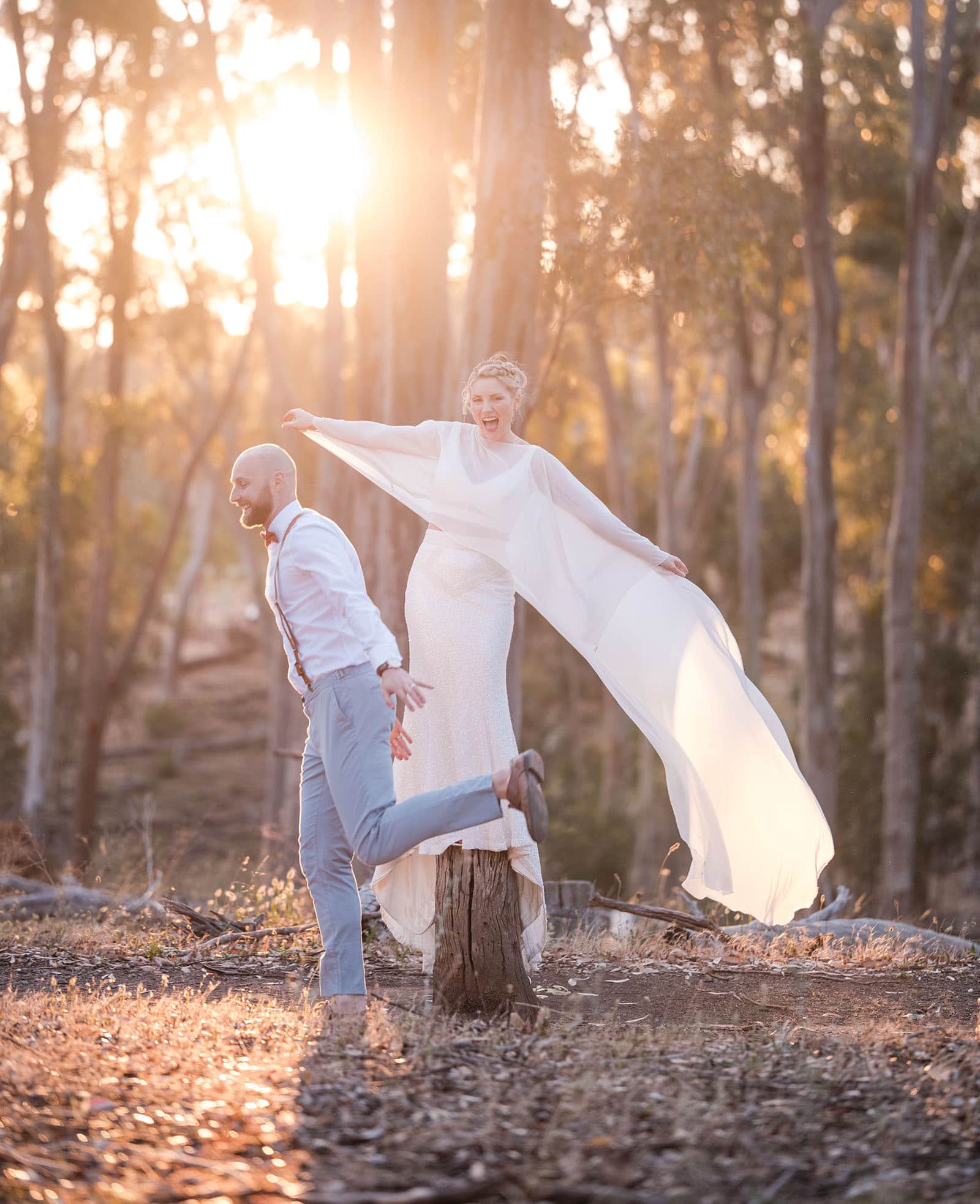 belair national park engagement shoot - lindsey & jaden 36 Bride and groom playful pose in sunset forest
