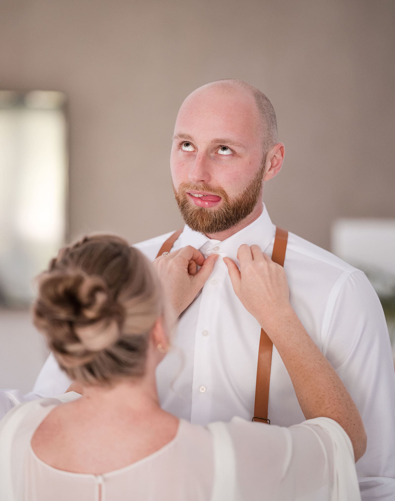 belair national park engagement shoot - lindsey & jaden 5 Groom getting ready with help for wedding day