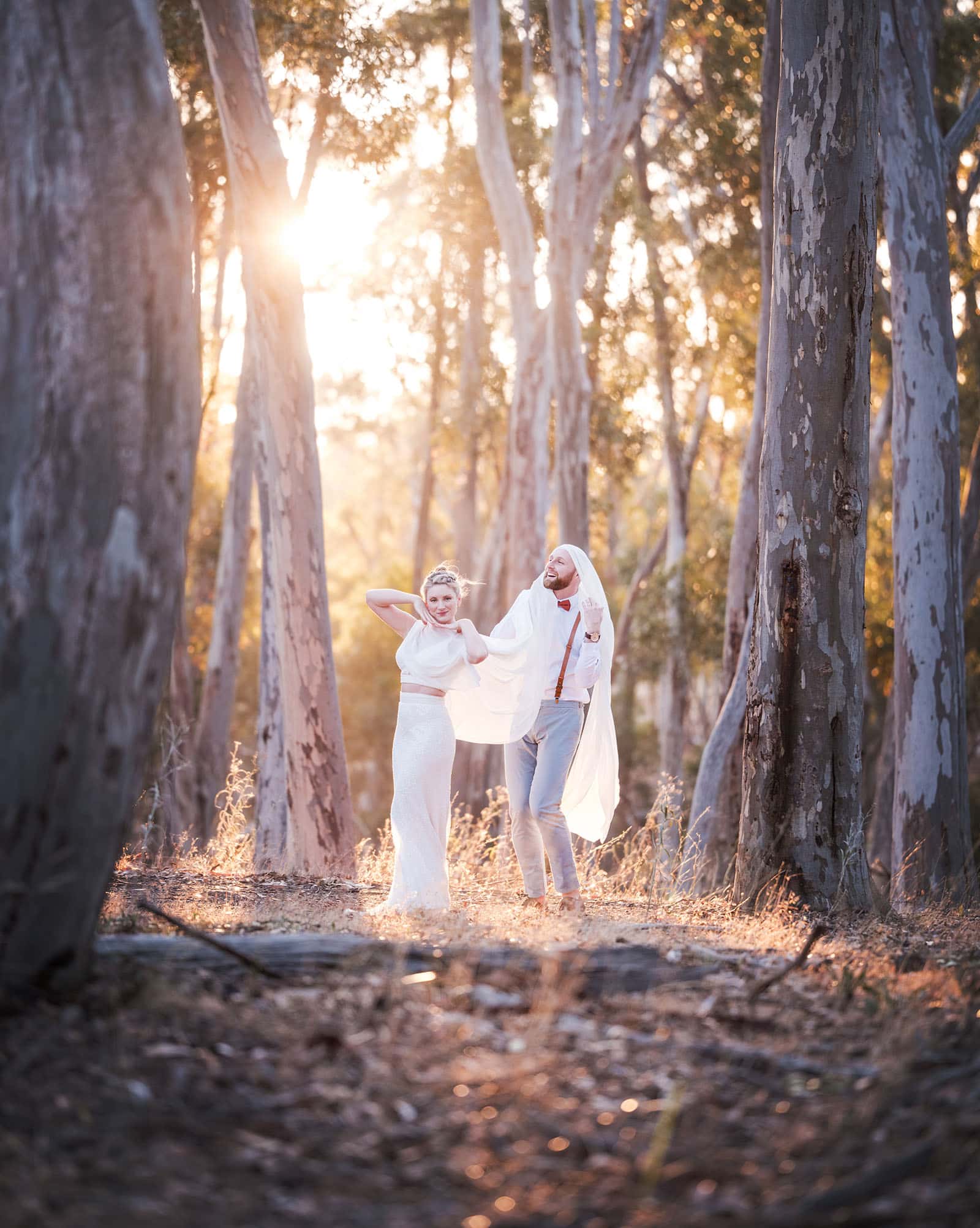 belair national park engagement shoot - lindsey & jaden 34 Couple walking in forest at sunset