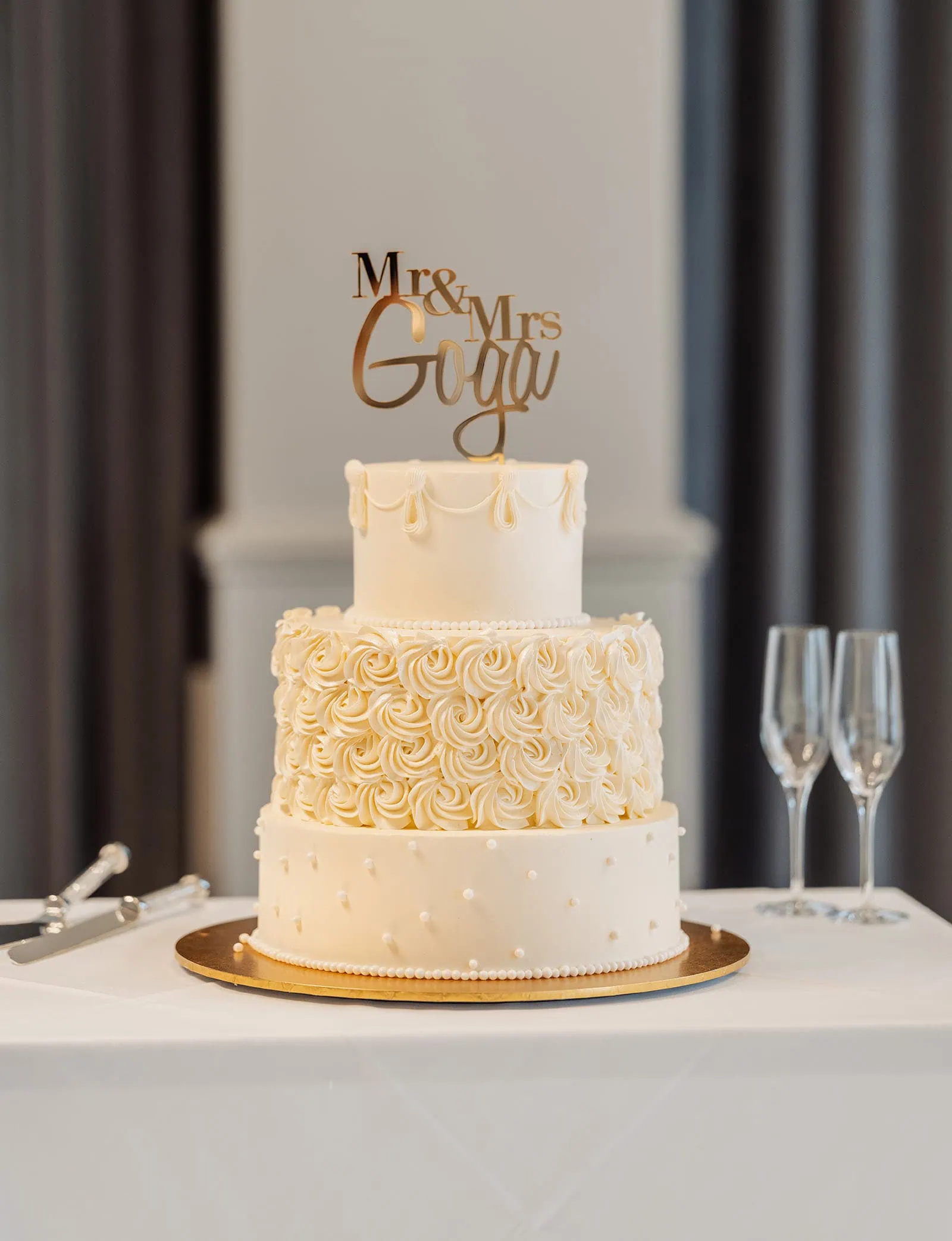 botanic gardens, araucaria avenue wedding - jade & hazim 62 Elegant three-tiered wedding cake with Mr. & Mrs. topper and champagne flutes.