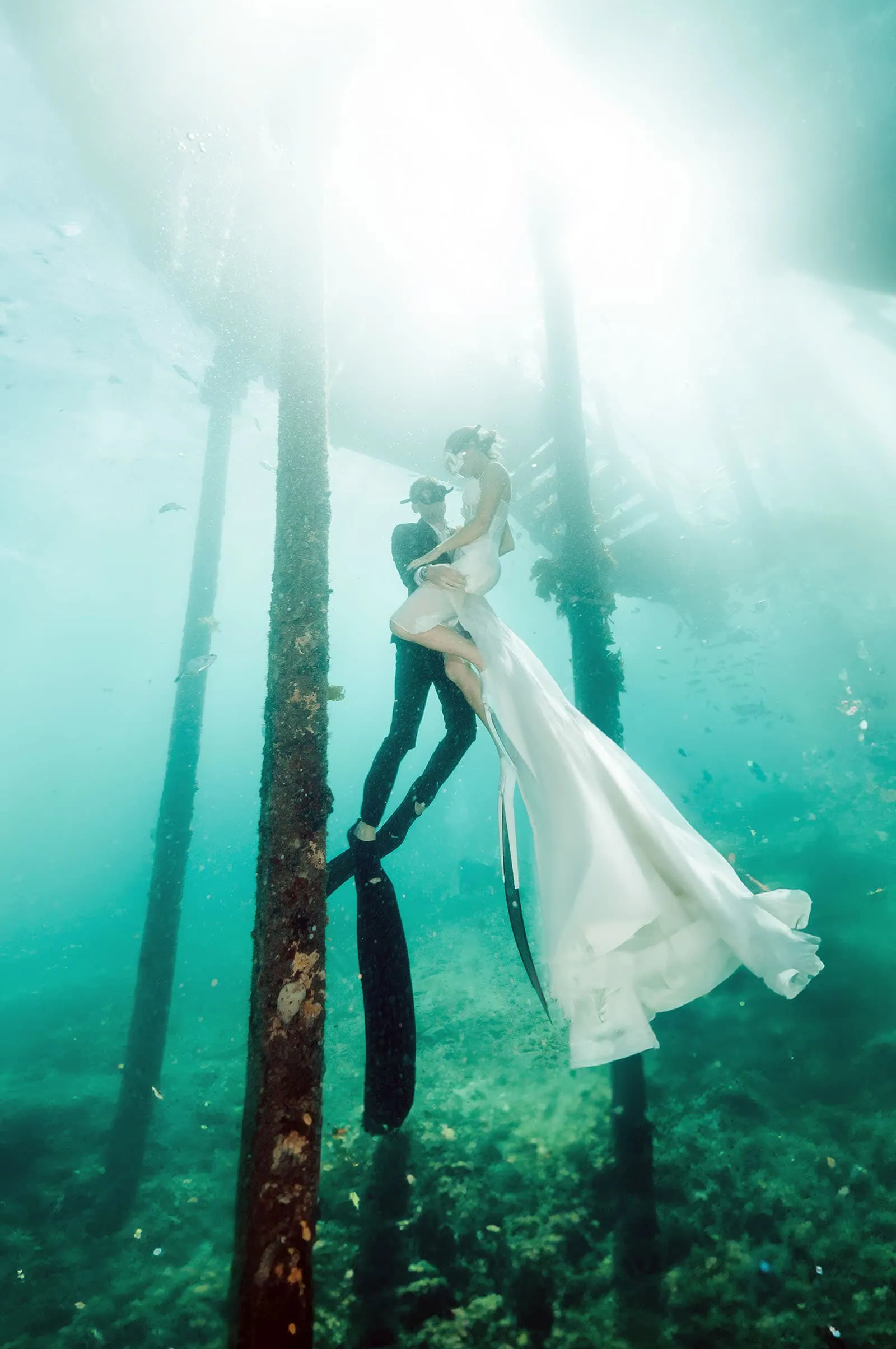 pt noarlunga underwater wreck the dress shoot - jess & jack 17 Underwater wedding couple sharing romantic moment, wearing bride gown and groom diving suit.