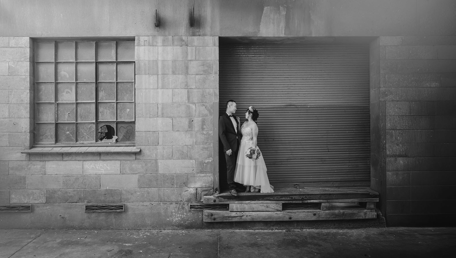 bumbunga lake photoshoot - tina & eric 52 Urban wedding couple in love amidst gritty industrial backdrop with graffiti art.