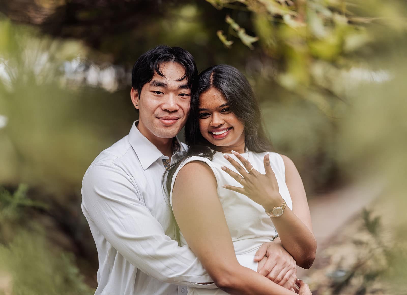 himeji gardens proposal - sam & eugenia 124 Sam and Eugenia smiling together in Himeji Gardens, with Eugenia showing her engagement ring.
