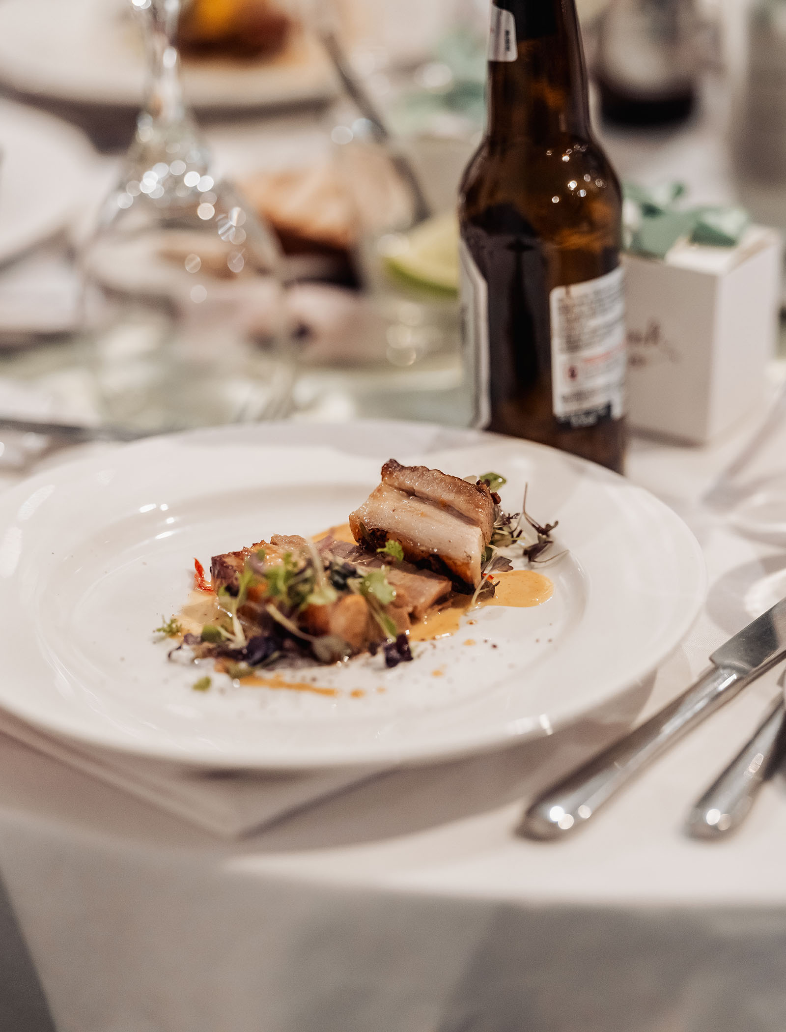 botanic gardens adelaide wedding - melanie & adrian 269 Elegant gourmet dining table with refined tableware and fine dining ambiance.