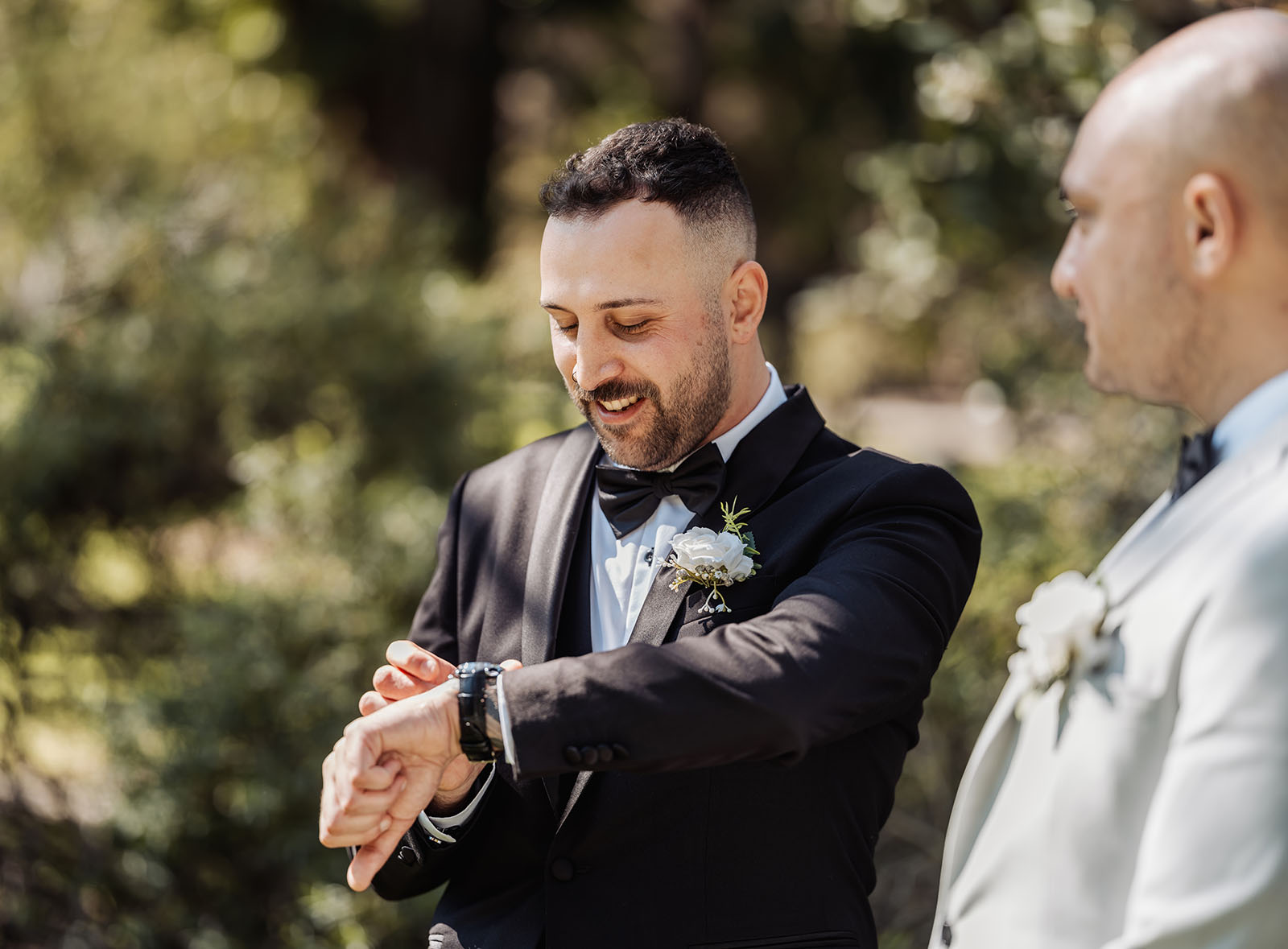 botanic gardens adelaide wedding - melanie & adrian 218 Joyful wedding celebration with bride, groom, and guests.
