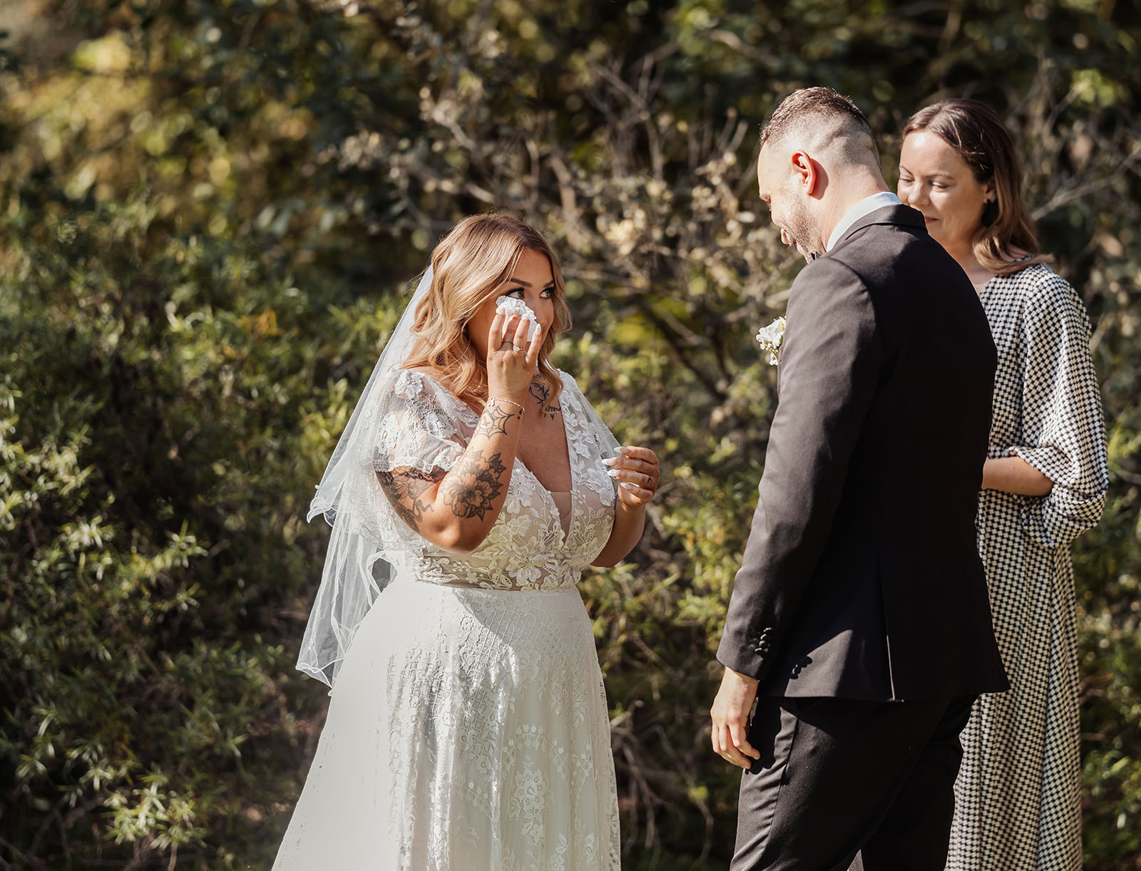 botanic gardens adelaide wedding - melanie & adrian 229 Outdoor wedding ceremony with elegant decorations and happy guests.
