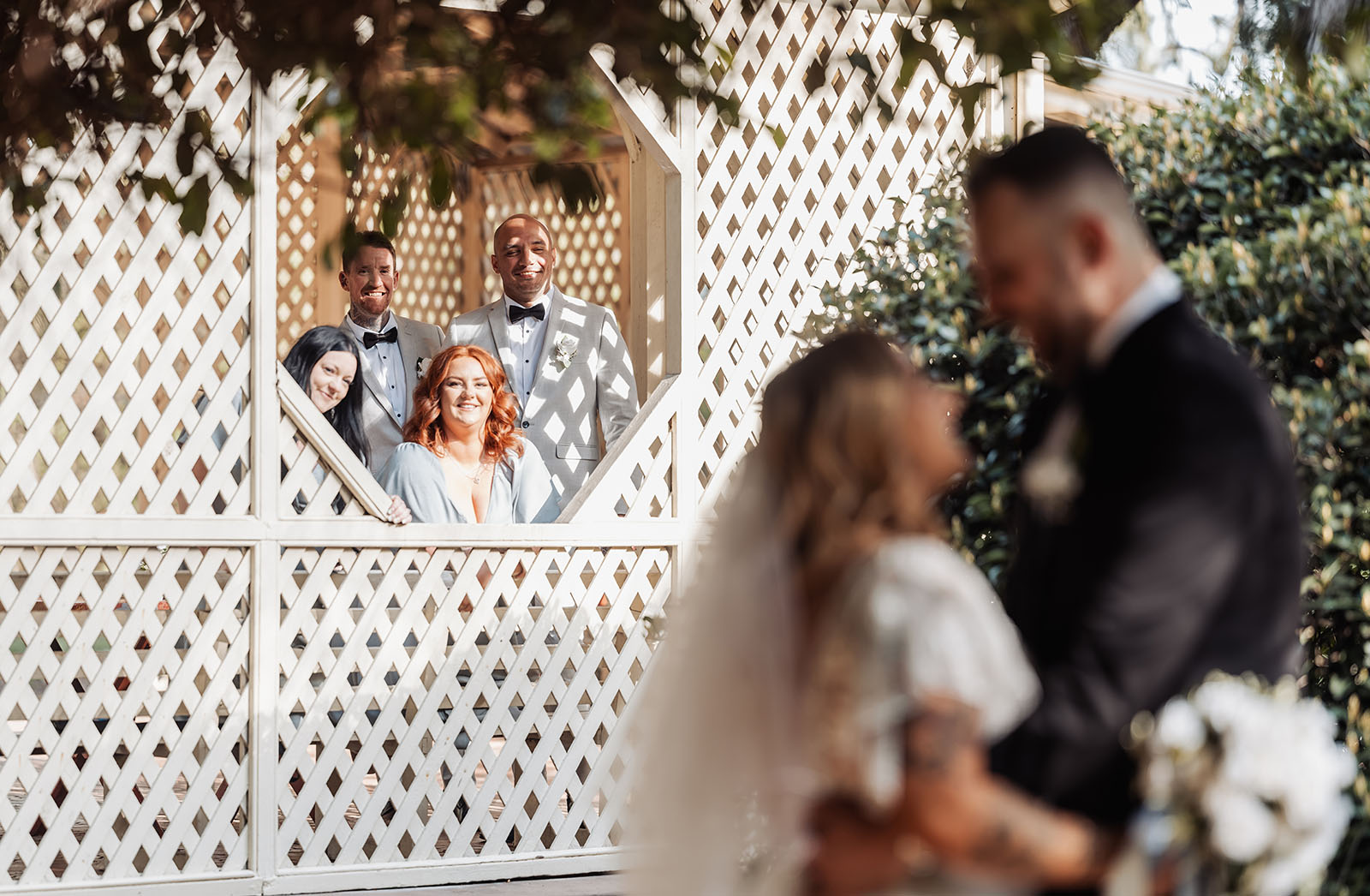 botanic gardens adelaide wedding - melanie & adrian 238 Joyful wedding couple sharing a tender moment on their special day.
