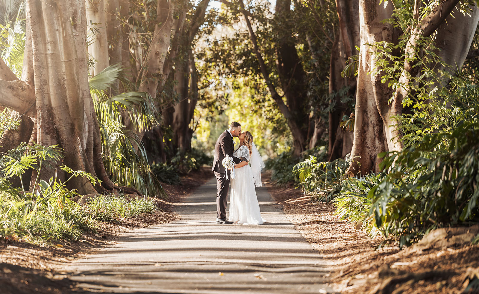 botanic gardens adelaide wedding - melanie & adrian 257 Forest wedding path with floral arch, enchanted woods setting.
