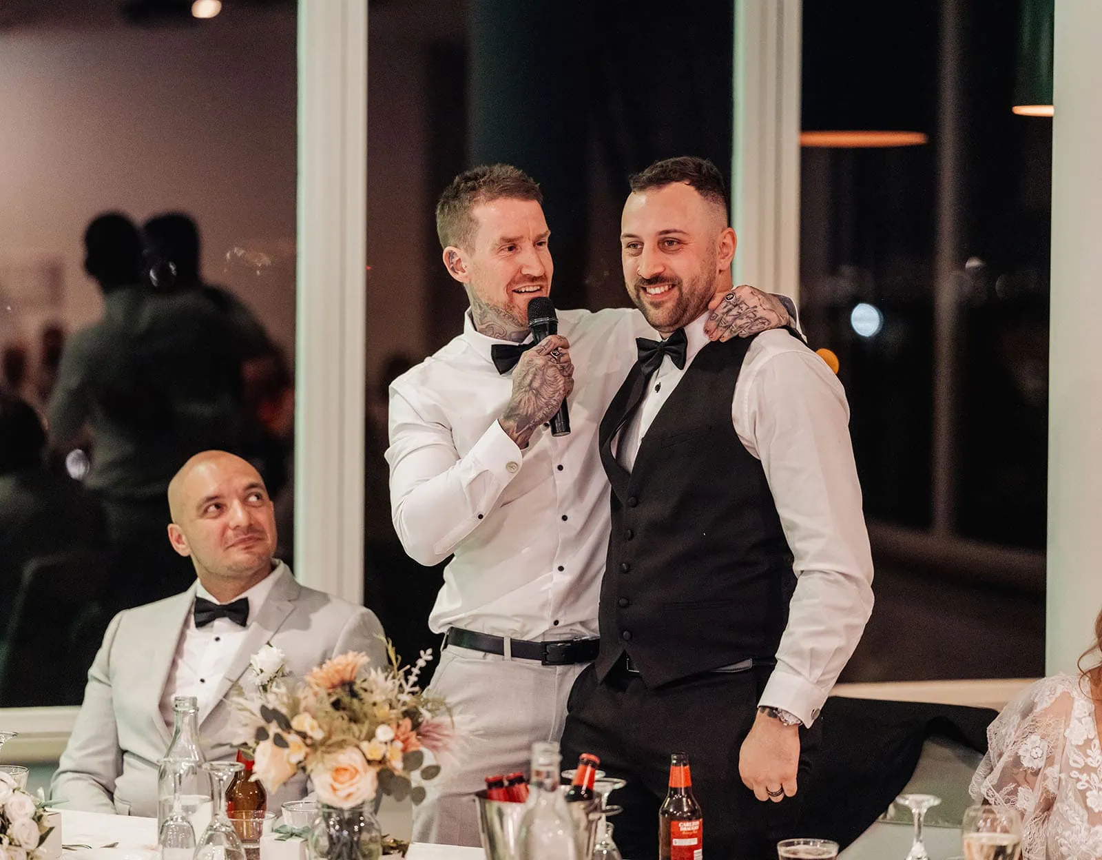 botanic gardens adelaide wedding - melanie & adrian 278 Wedding speech moment: joyful celebration with bride, groom, and guests.
