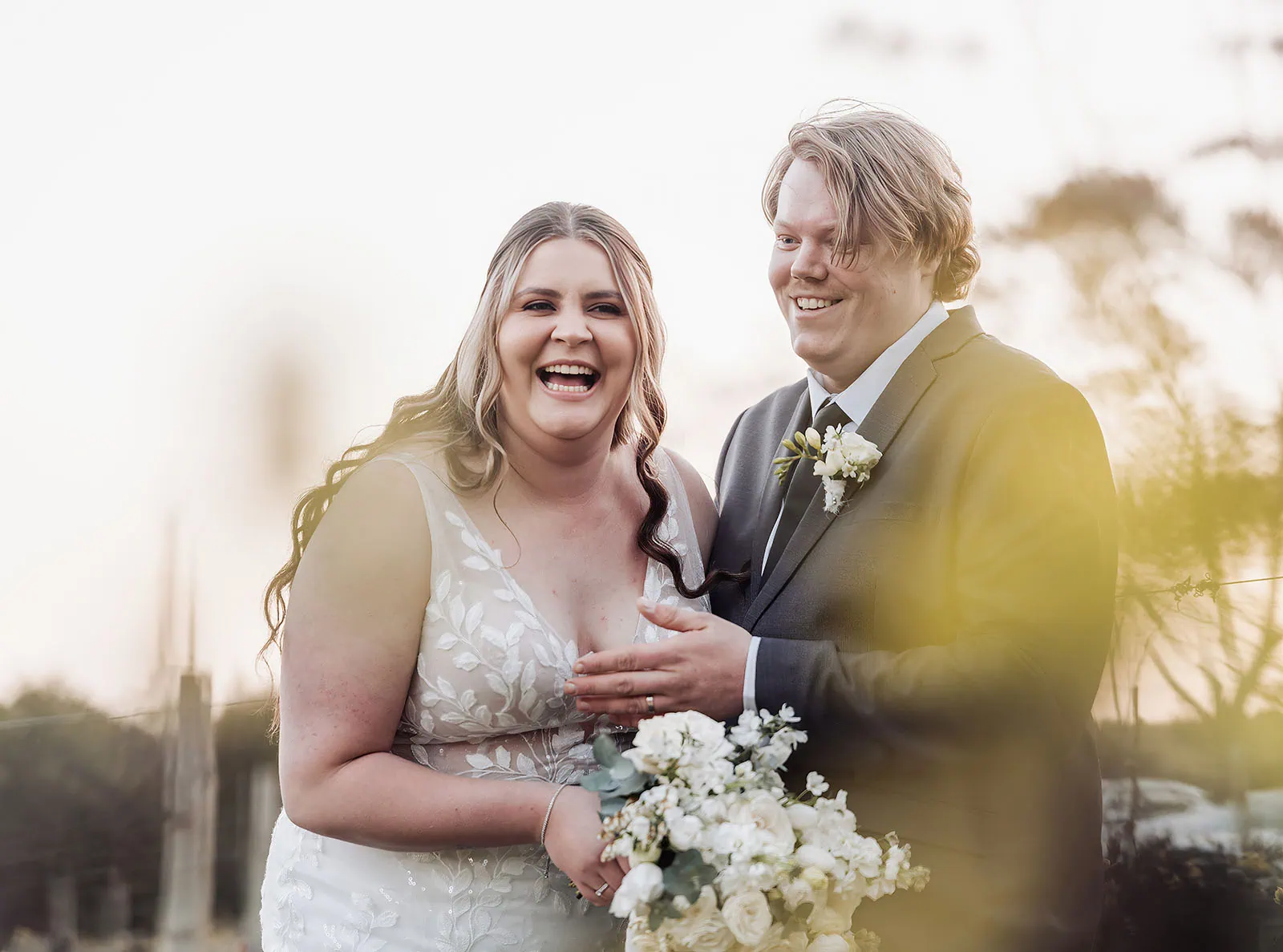 beach rd wines wedding - hana & jessie 79 Bride and groom exchange vows in scenic outdoor ceremony.