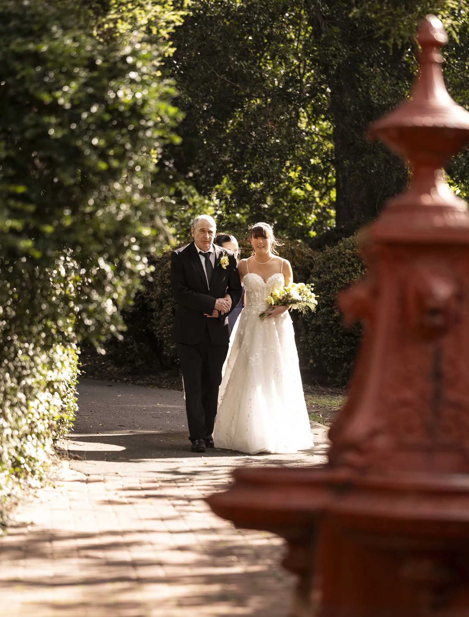 adelaide botanic gardens summerhouse wedding - belinda & ian 161 Bride and father walking down the aisle, wedding ceremony moment.