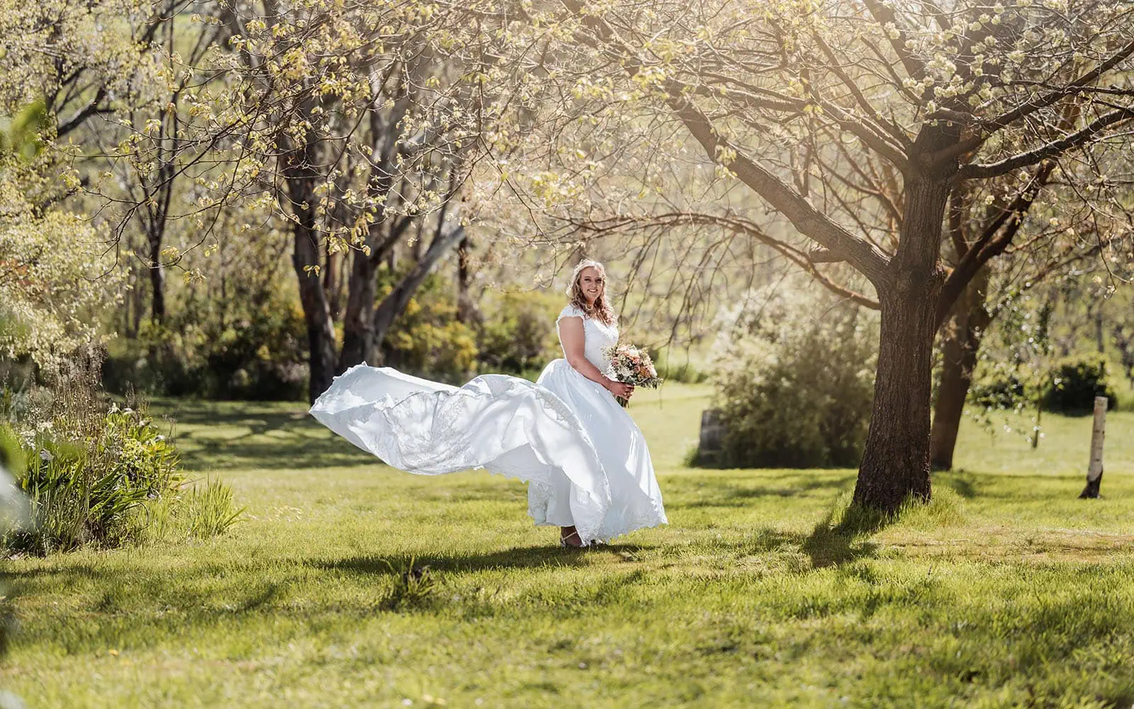 grand cru estate wedding - isabella & nick 118 Elegant bride in garden setting, outdoor wedding celebration.