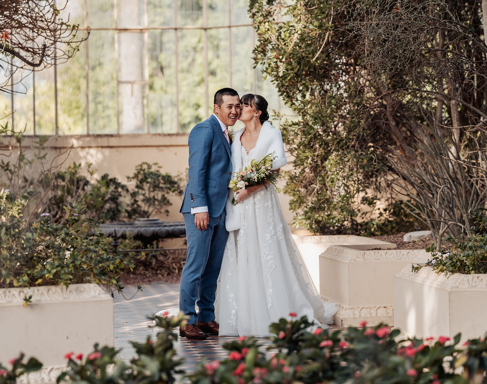 adelaide botanic gardens summerhouse wedding - belinda & ian 182 Bride and groom in garden setting, celebrating elegant outdoor wedding ceremony.