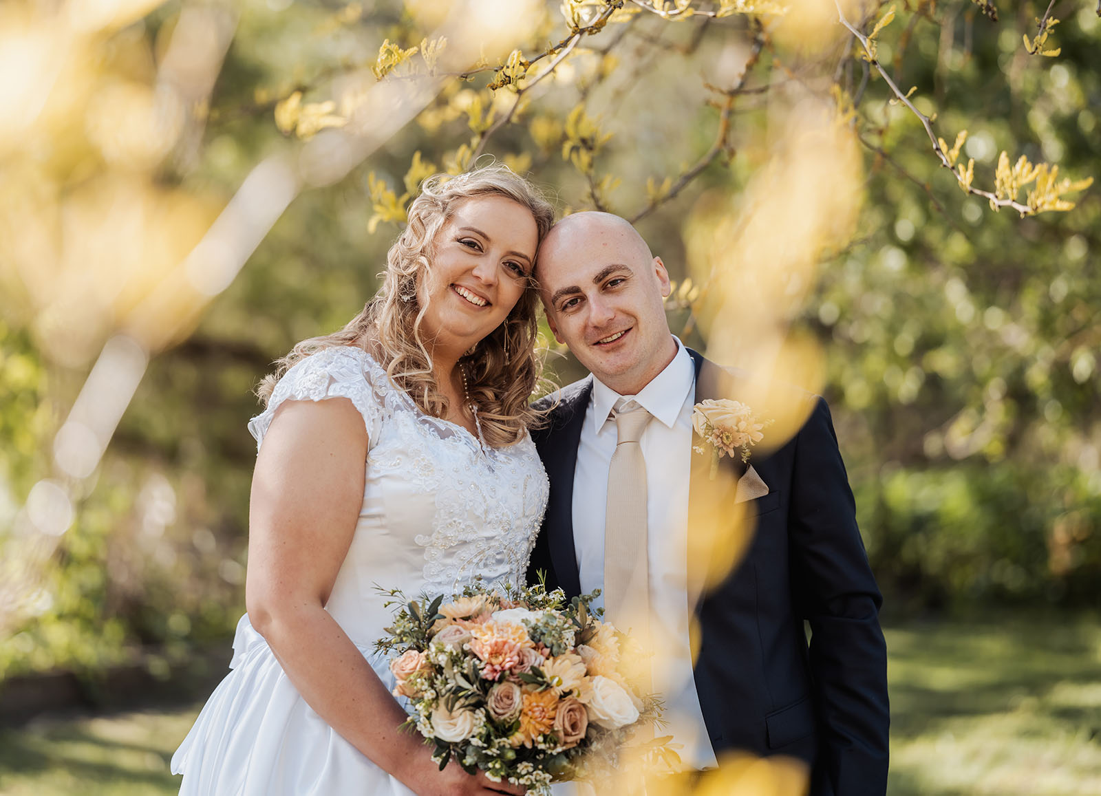 grand cru estate wedding - isabella & nick 135 Bride and groom standing under white wedding canopy, exchanging vows outdoors.