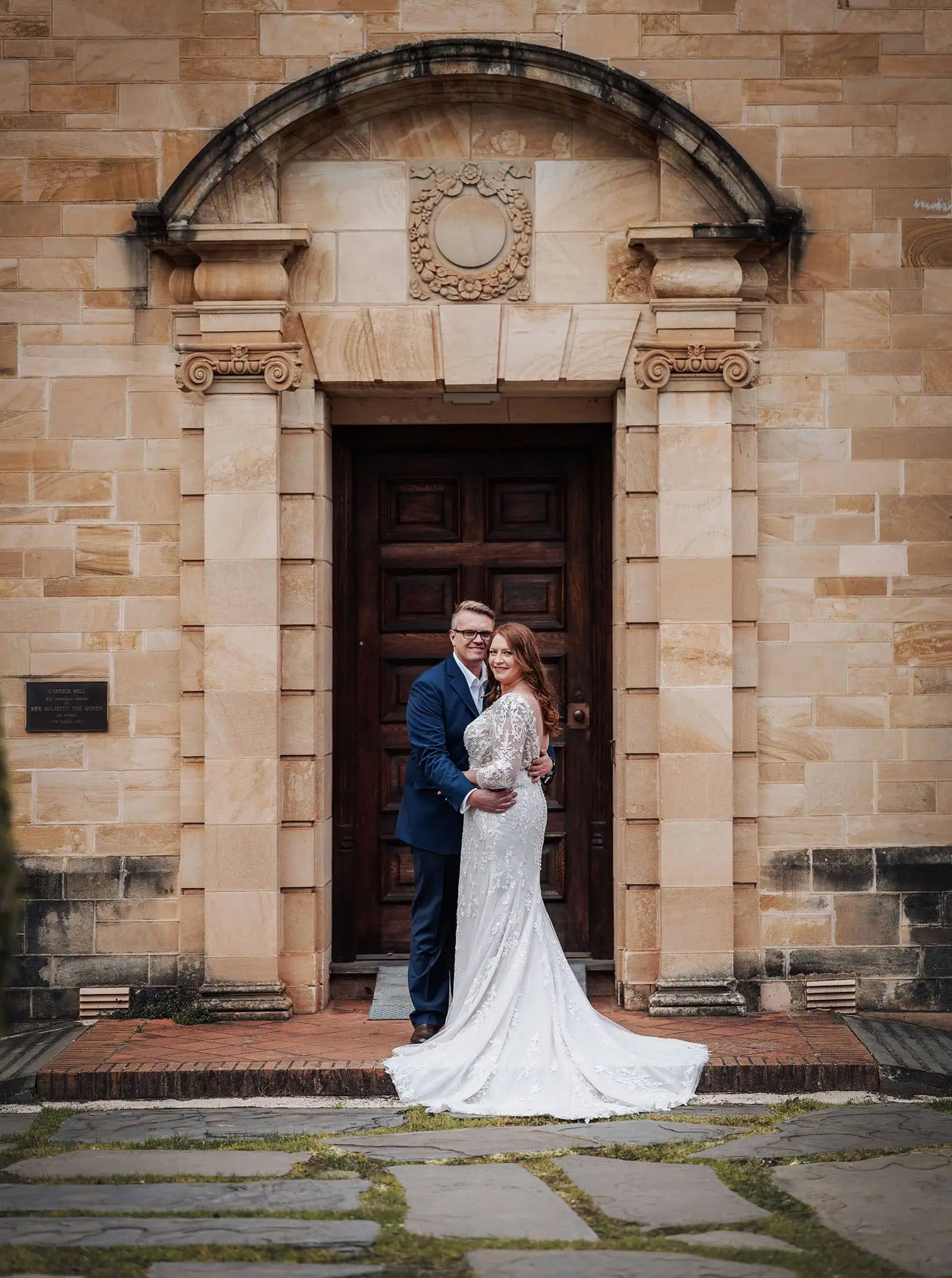 carrick hill wedding - jo & david 285 Couple constructing stone building, teamwork architecture, joint project, outdoor construction.