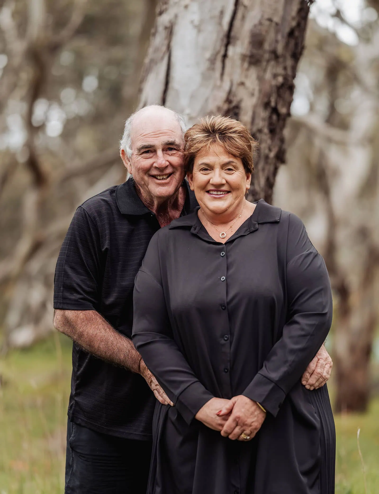 myponga family photography 9 Senior couple enjoying a sunny park walk, embracing nature and leisure.