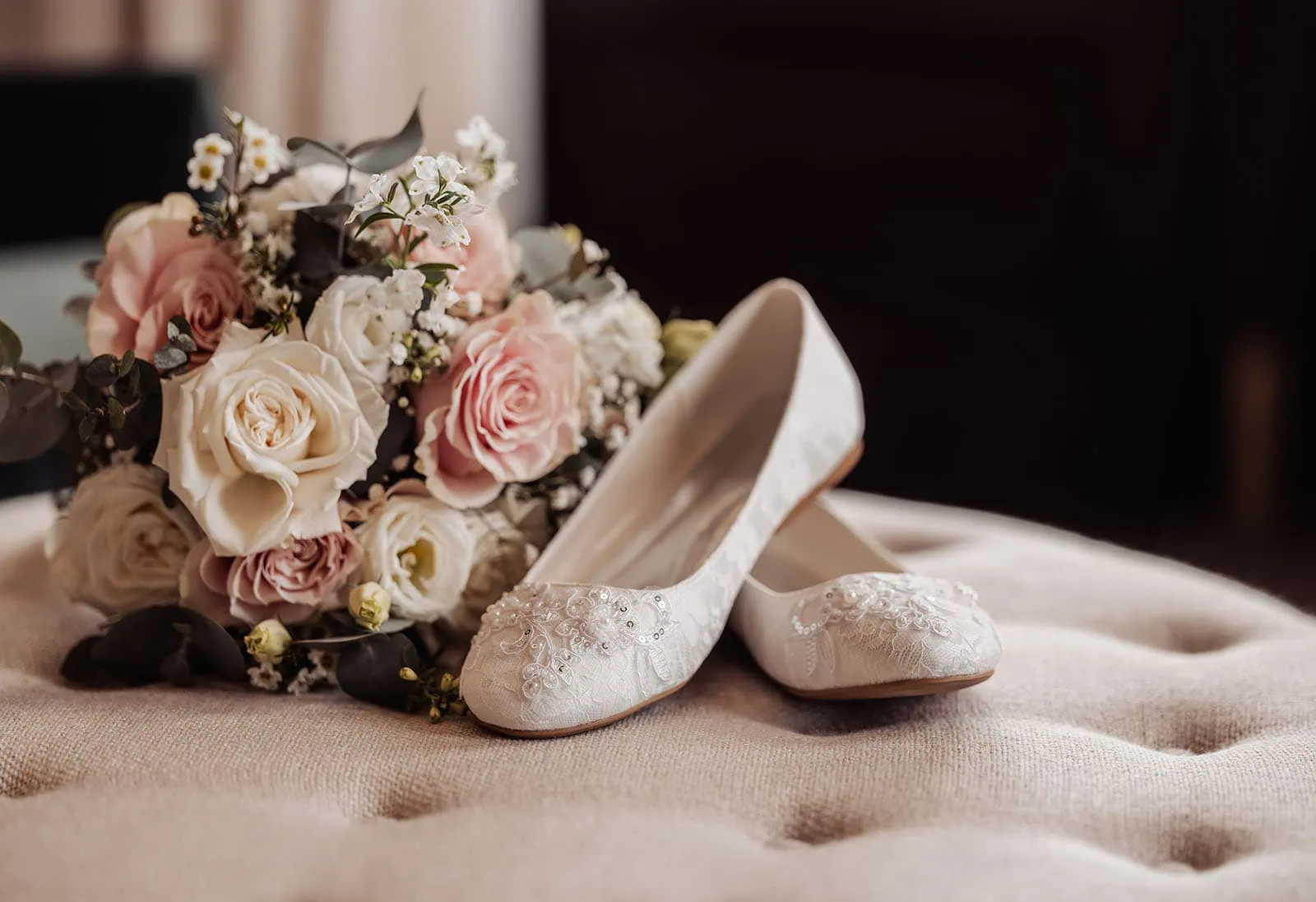 mt lofty house elopement - kimberley & michael 170 Elegant bridal bouquet with ivory heels on display.
