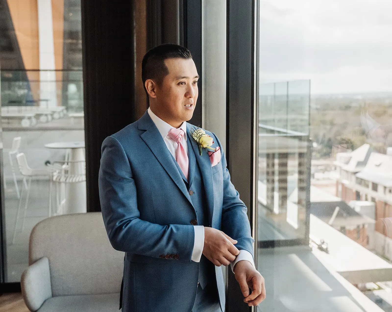 adelaide botanic gardens summerhouse wedding - belinda & ian 135 Elegant man wearing a blue suit, showcasing fashion and style.
