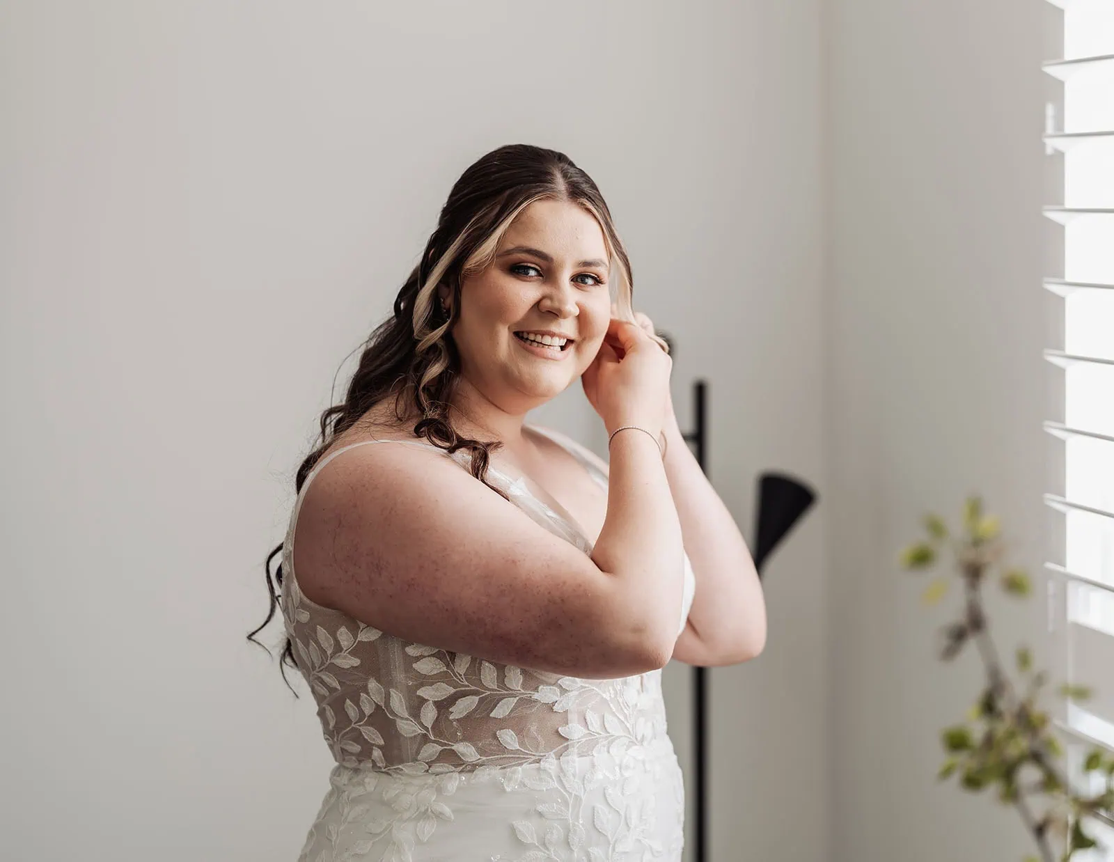 beach rd wines wedding - hana & jessie 41 Elegant woman in a white dress, showcasing classic style and sophistication.