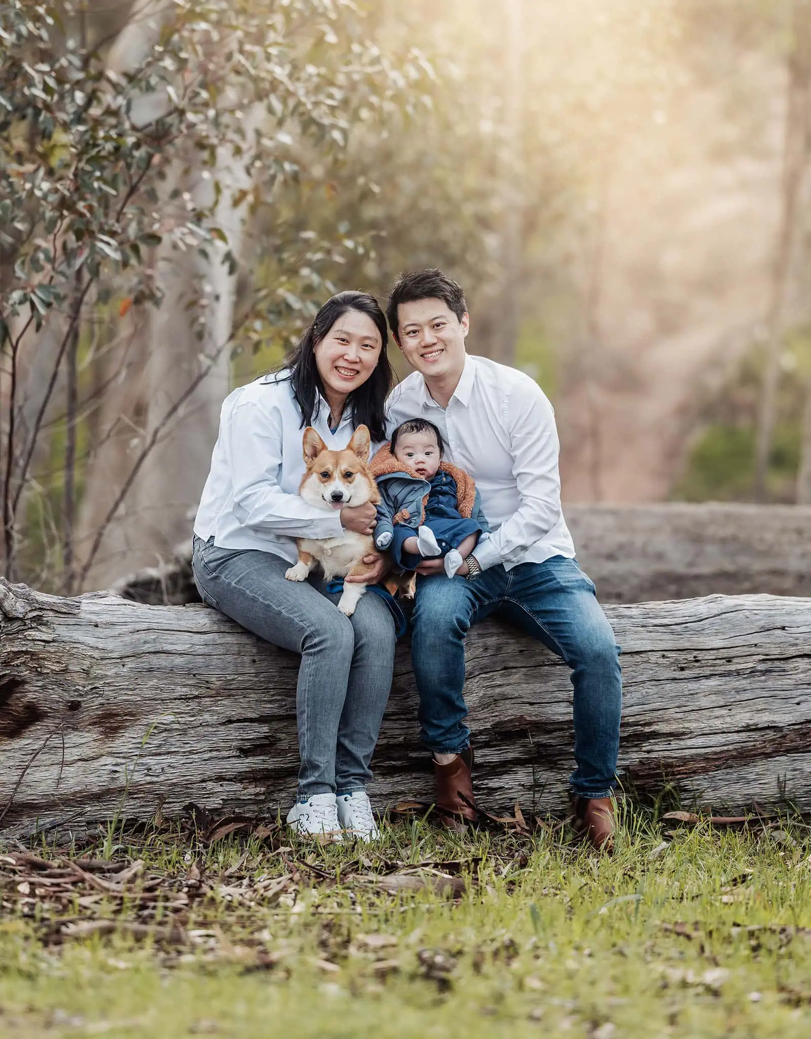 belair family photography 119 Family enjoying a scenic nature walk in lush green forest.
