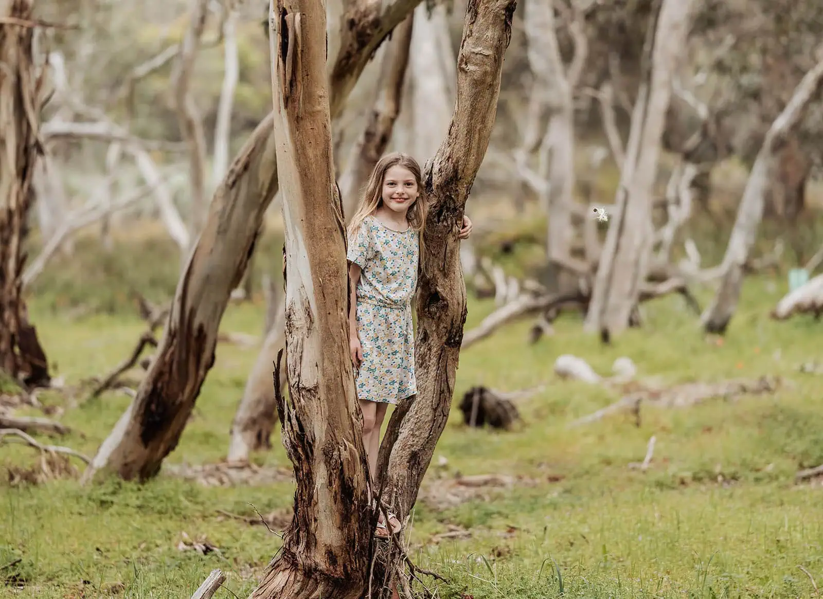 myponga family photography 21 Girl exploring lush green forest scenery.