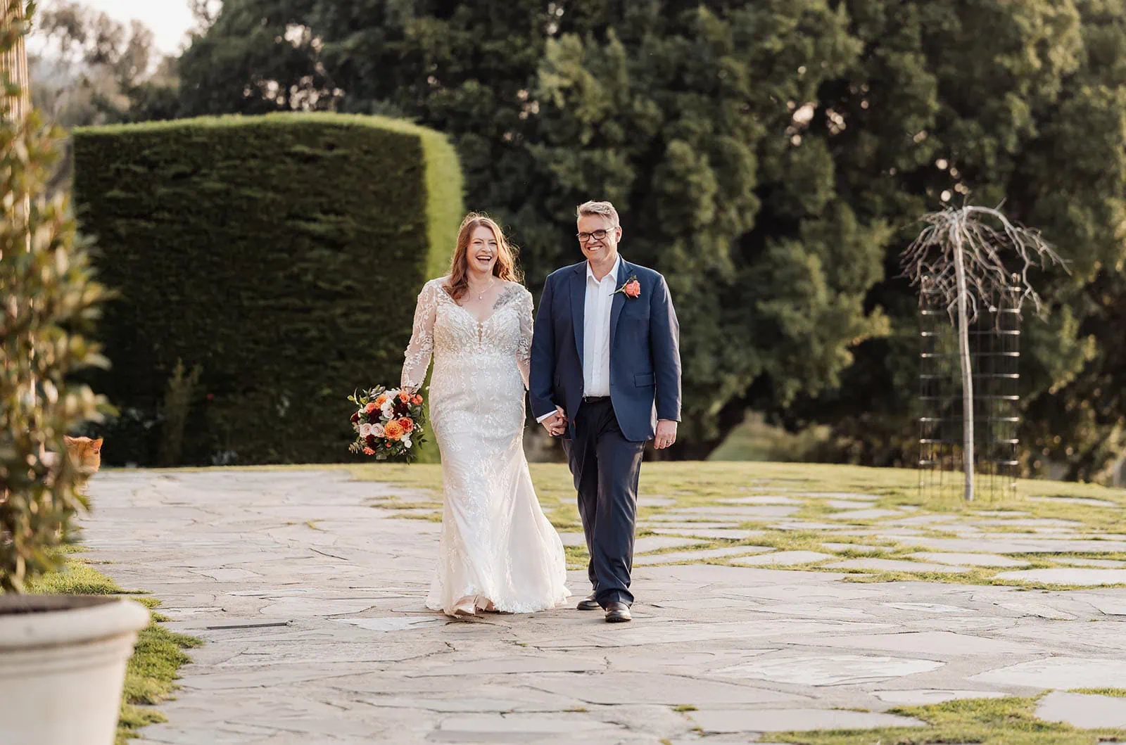 carrick hill wedding - jo & david 303 Happy couple celebrates outdoor garden wedding ceremony.