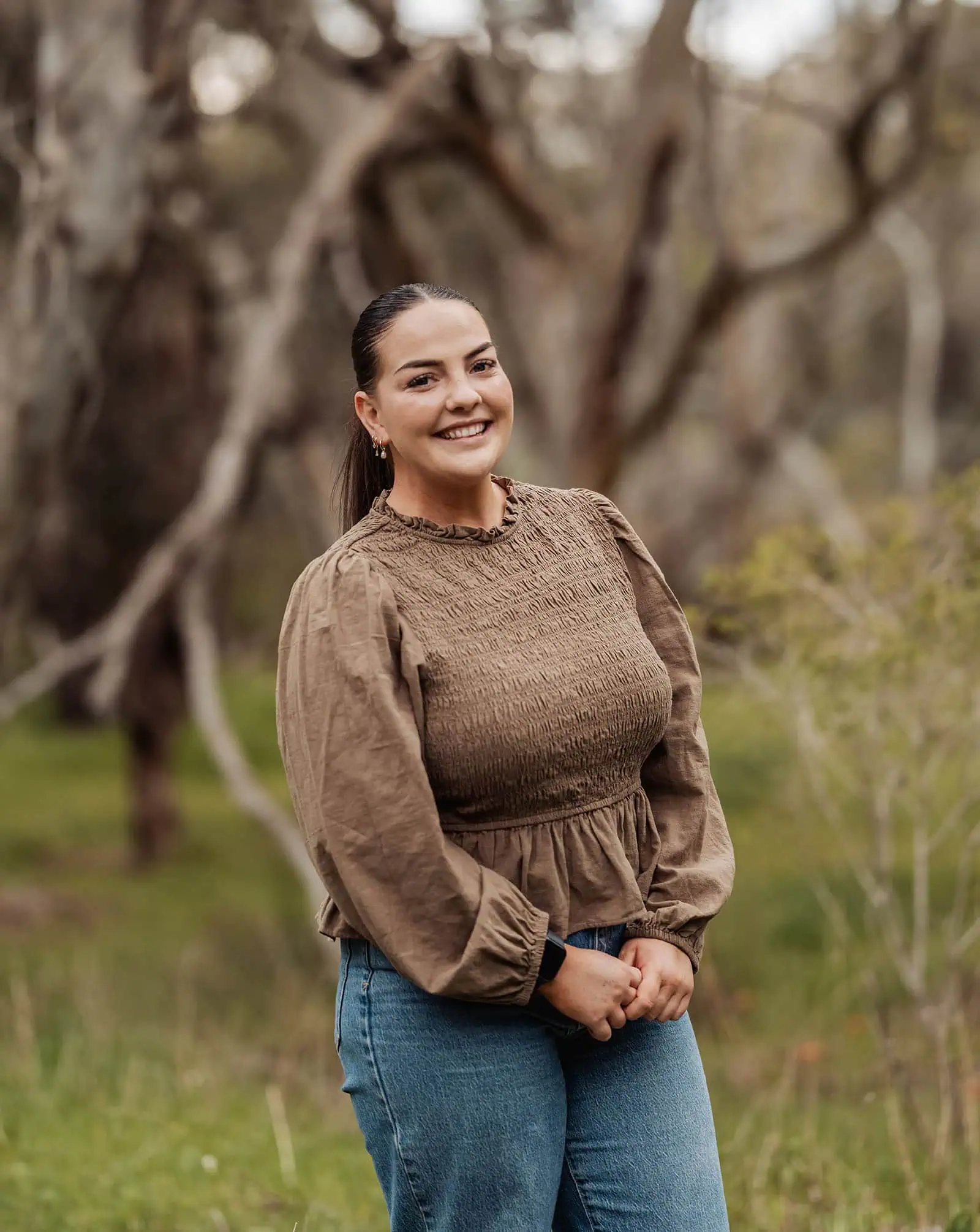 myponga family photography 12 Portrait of a person enjoying nature outdoors, capturing sunlight and serene expressions.