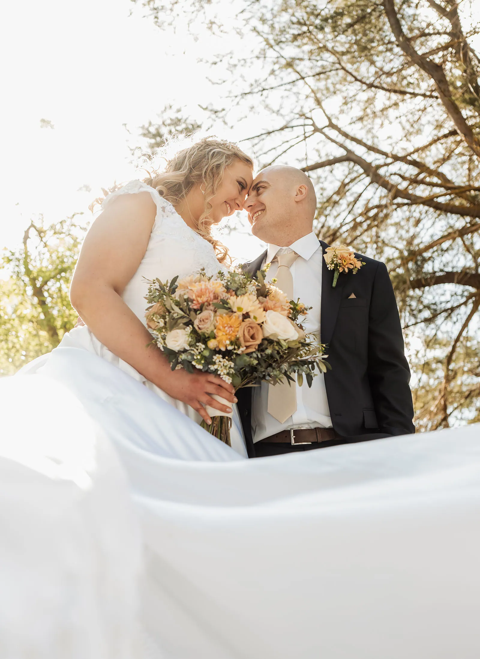 grand cru estate wedding - isabella & nick 132 Newlywed couple celebrating elegant outdoor wedding ceremony with joy.