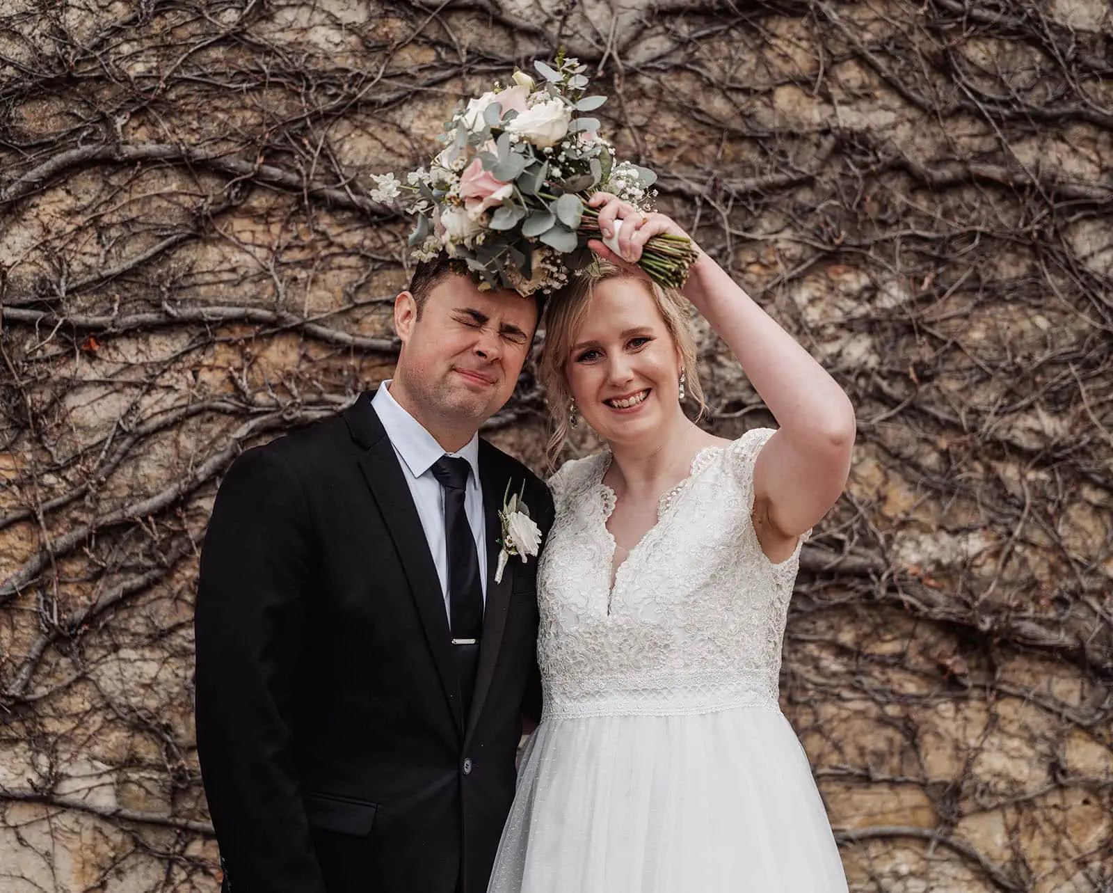 mt lofty house elopement - kimberley & michael 198 Playful newlyweds at wedding, laughing and enjoying their special day.