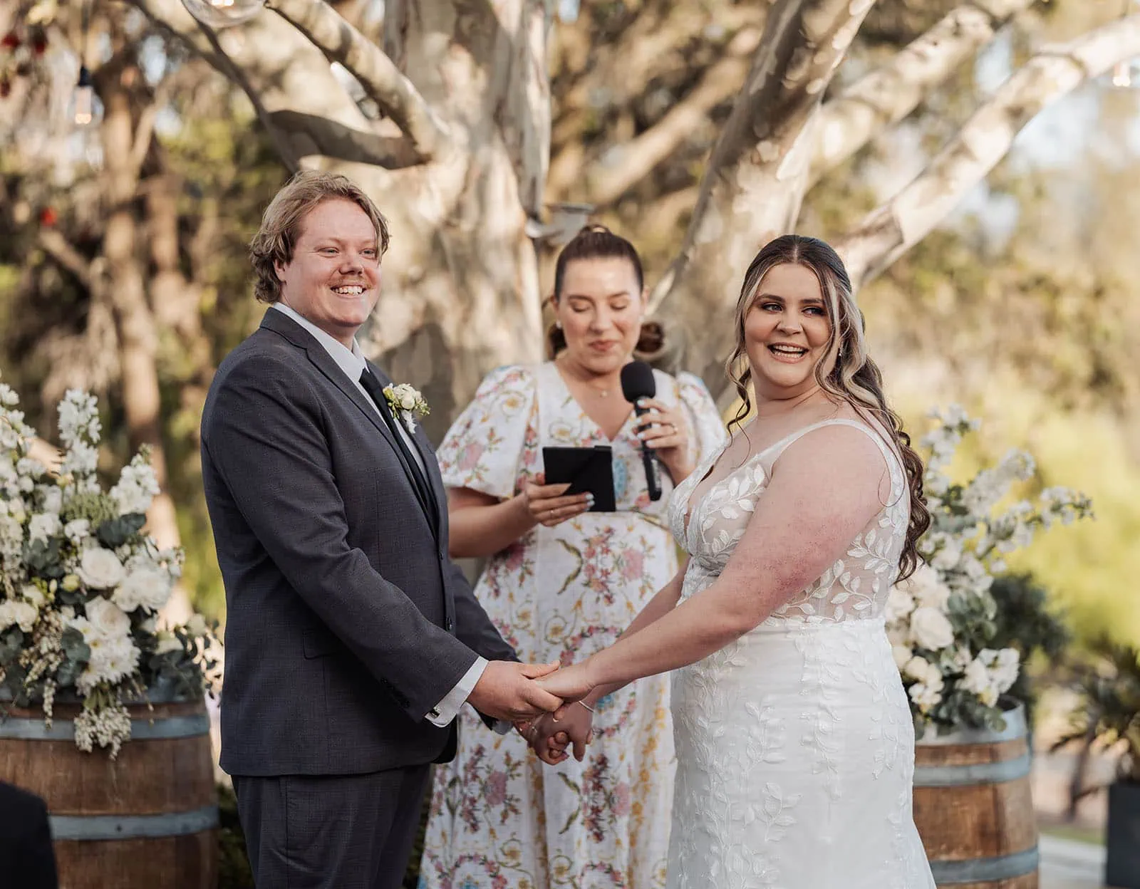 beach rd wines wedding - hana & jessie 59 Sunset outdoor wedding ceremony with romantic lighting and scenic views.