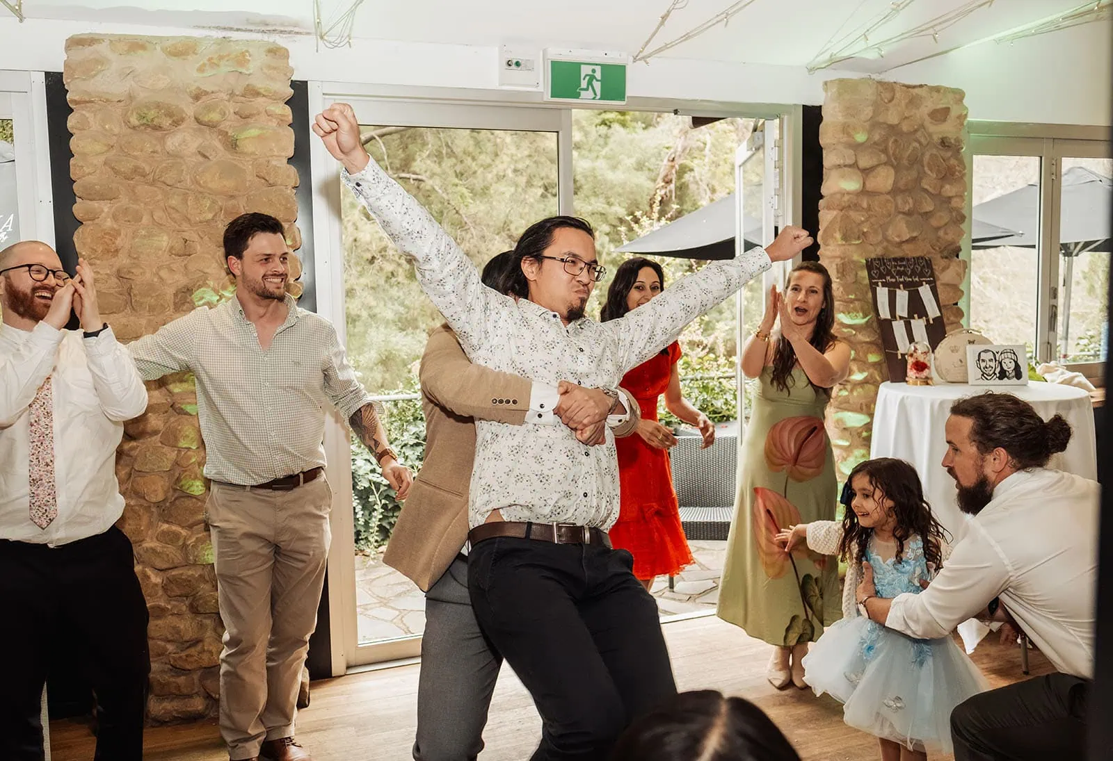 utopia waterfall gully wedding - sally & ben 266 Dance party celebration with friends enjoying music and lights.