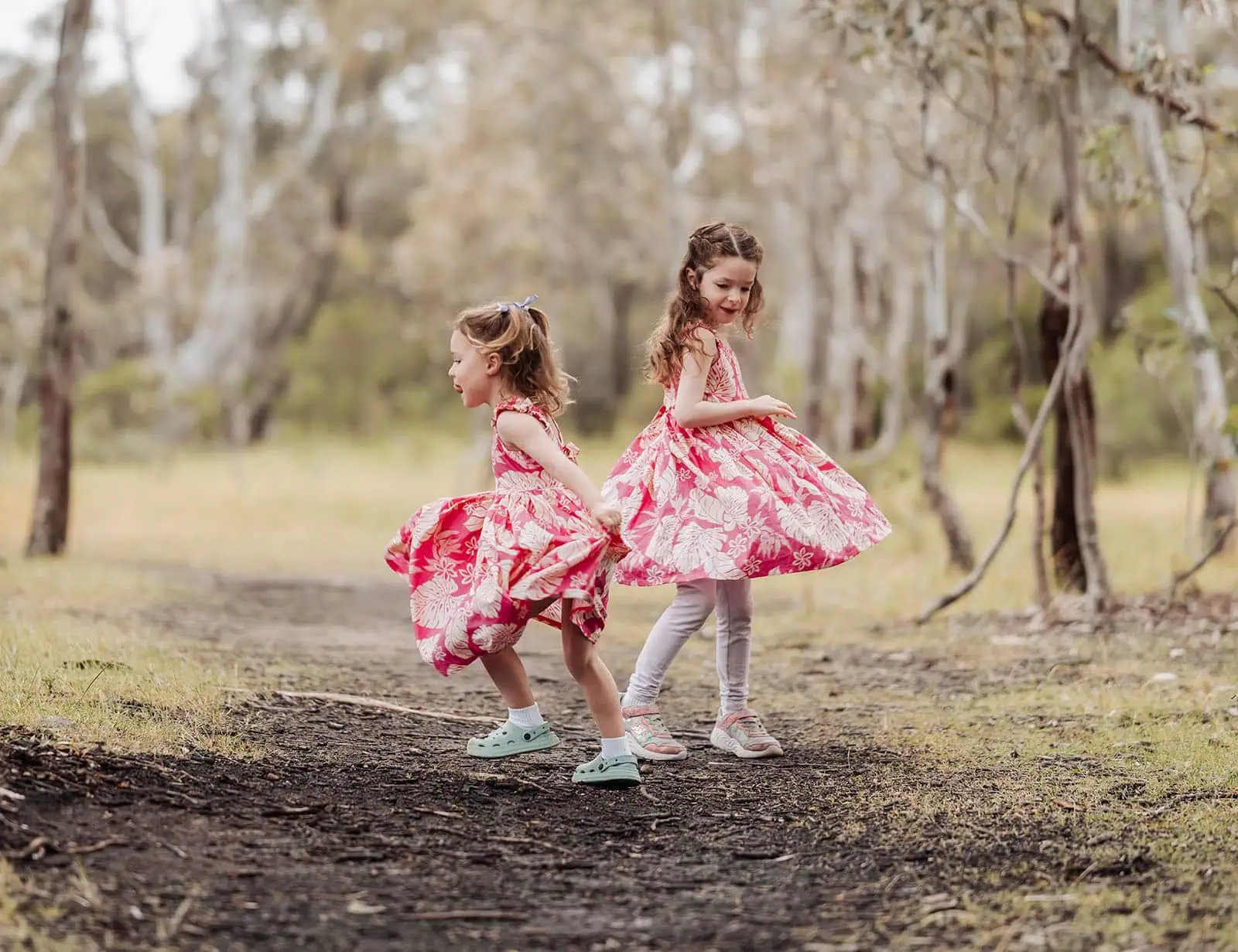 happy valley reservoir family photoshoot 2 Joyful girls playing outside, enjoying nature and sunshine.