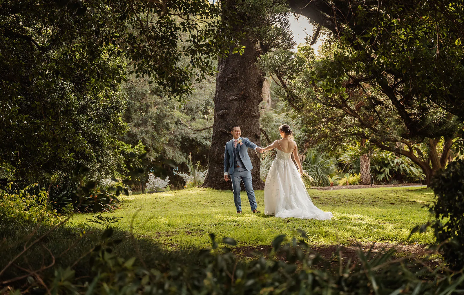 adelaide botanic gardens summerhouse wedding - belinda & ian 175 Elegant garden wedding featuring romantic floral arrangements and a happy couple.