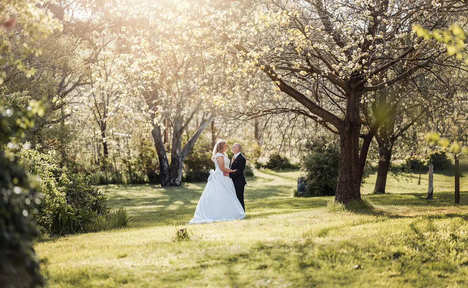 grand cru estate wedding - isabella & nick 143 Scenic outdoor wedding ceremony with romantic decor and picturesque landscape.