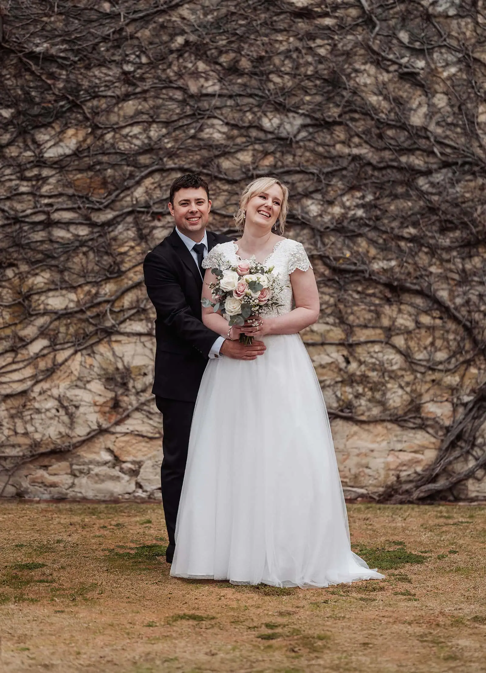 mt lofty house elopement - kimberley & michael 197 Rustic outdoor wedding scene with vintage decor and joyful couple celebrating.