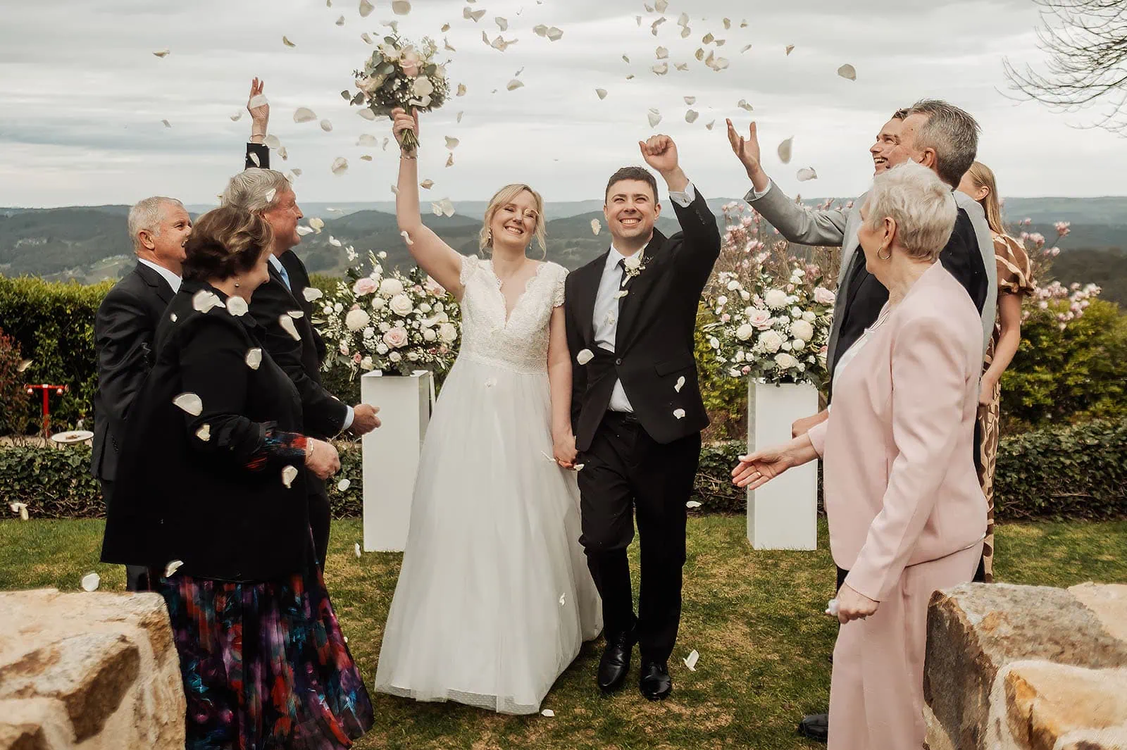 mt lofty house elopement - kimberley & michael 187 Outdoor wedding celebration with joyful guests, elegant decor, and scenic backdrop.