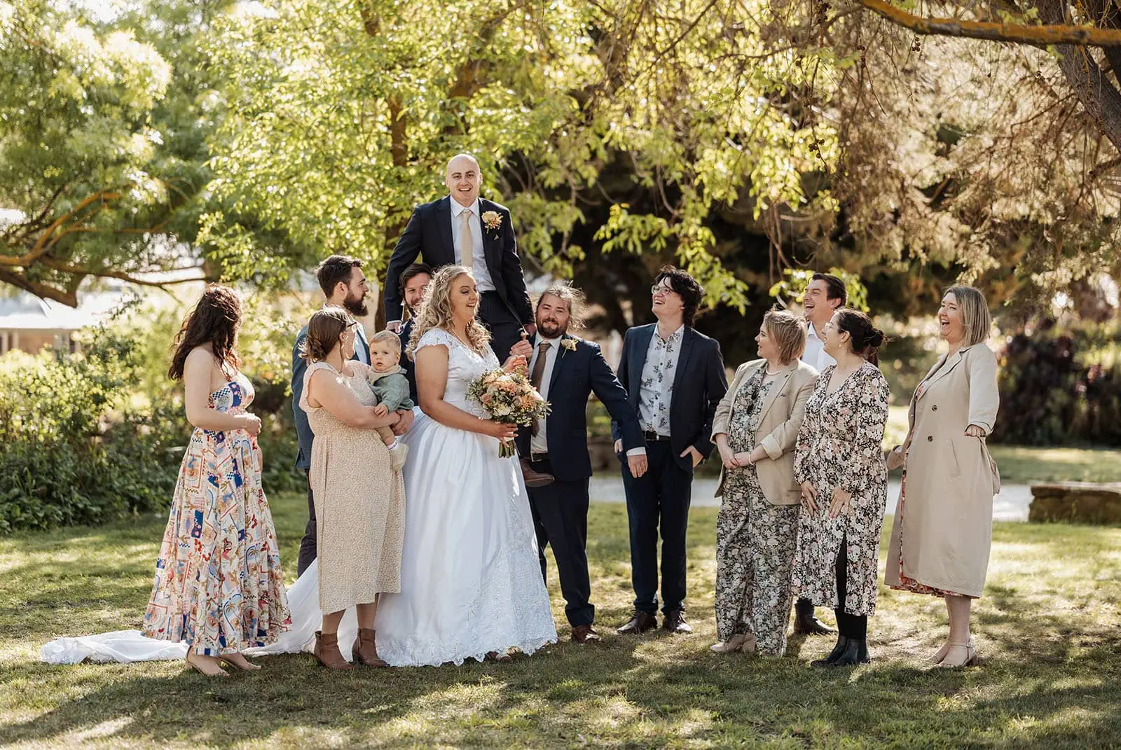 grand cru estate wedding - isabella & nick 131 Elegant wedding celebration with joyful guests, beautiful decorations, and a stunning bride and groom.
