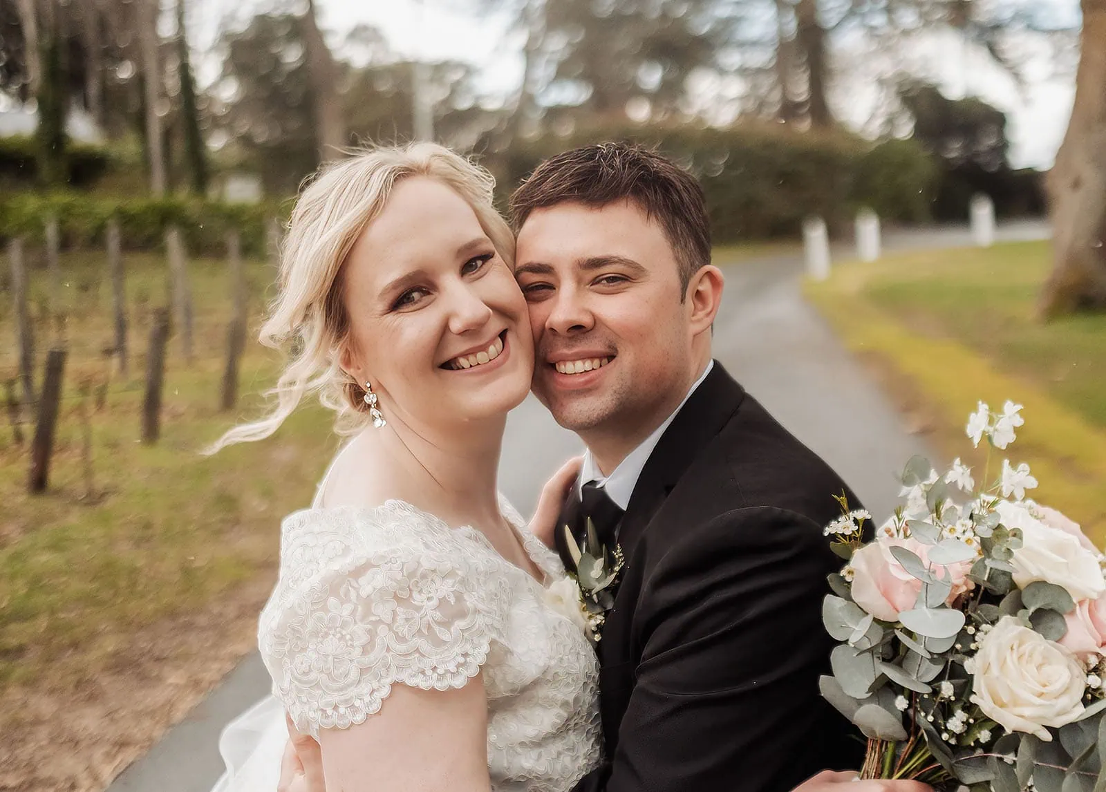 mt lofty house elopement - kimberley & michael 207 Bride and groom embracing in romantic wedding moment.