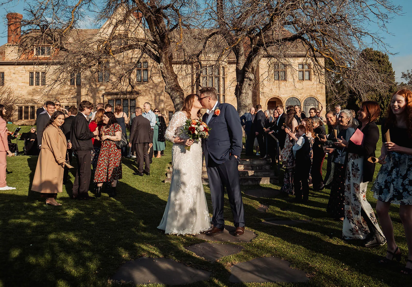 carrick hill wedding - jo & david 298 Bride and groom exchange vows in picturesque garden ceremony.