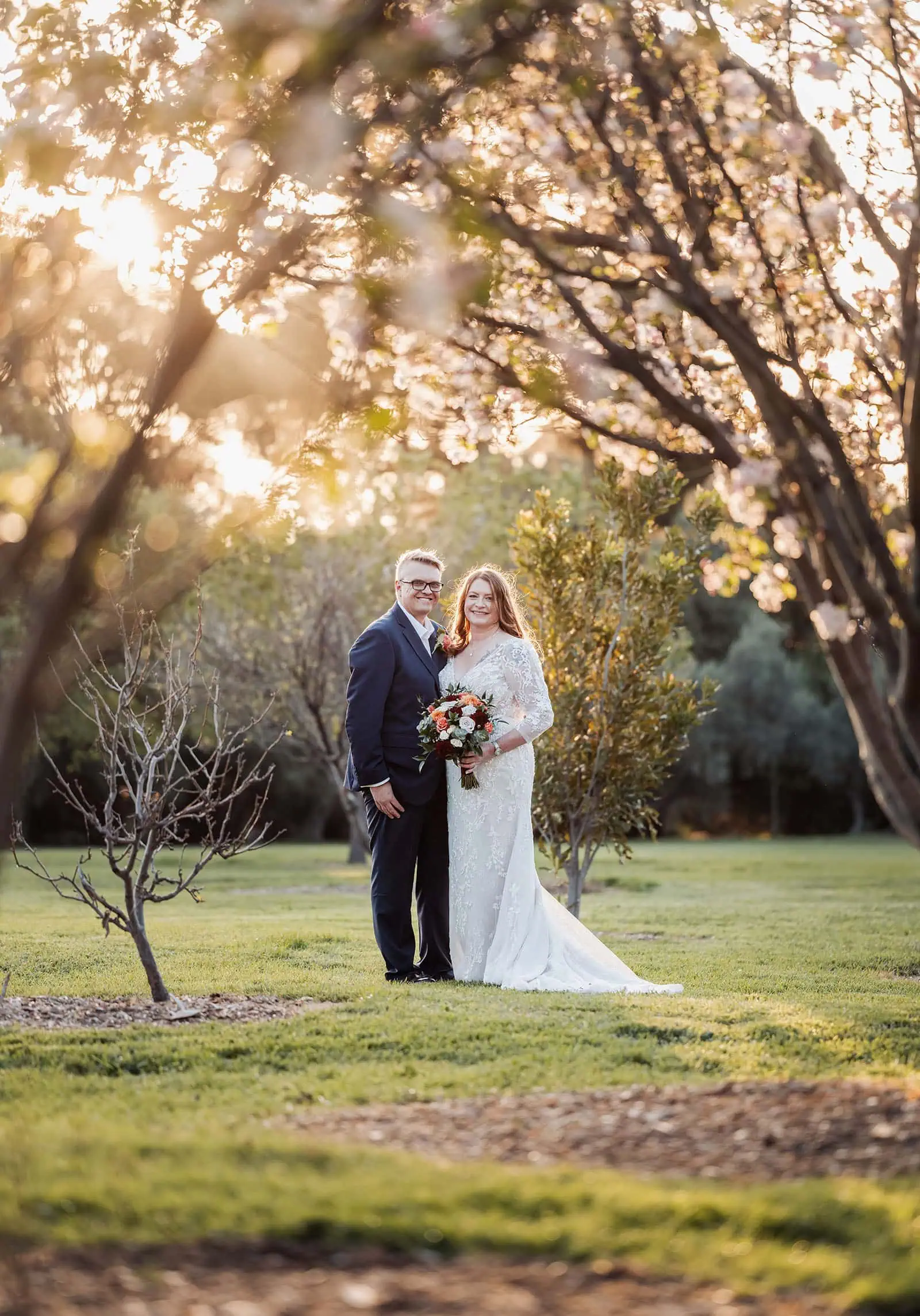 carrick hill wedding - jo & david 310 Romantic wedding couple embraces in scenic outdoor nature setting.