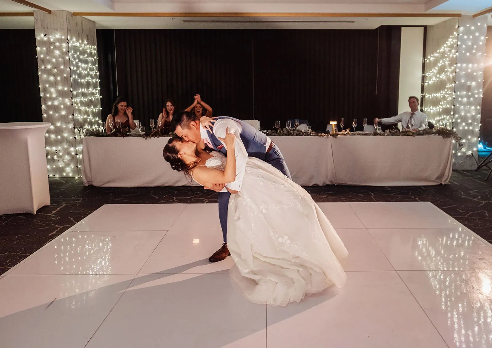 adelaide botanic gardens summerhouse wedding - belinda & ian 207 Bride and groom share romantic kiss during wedding dance.