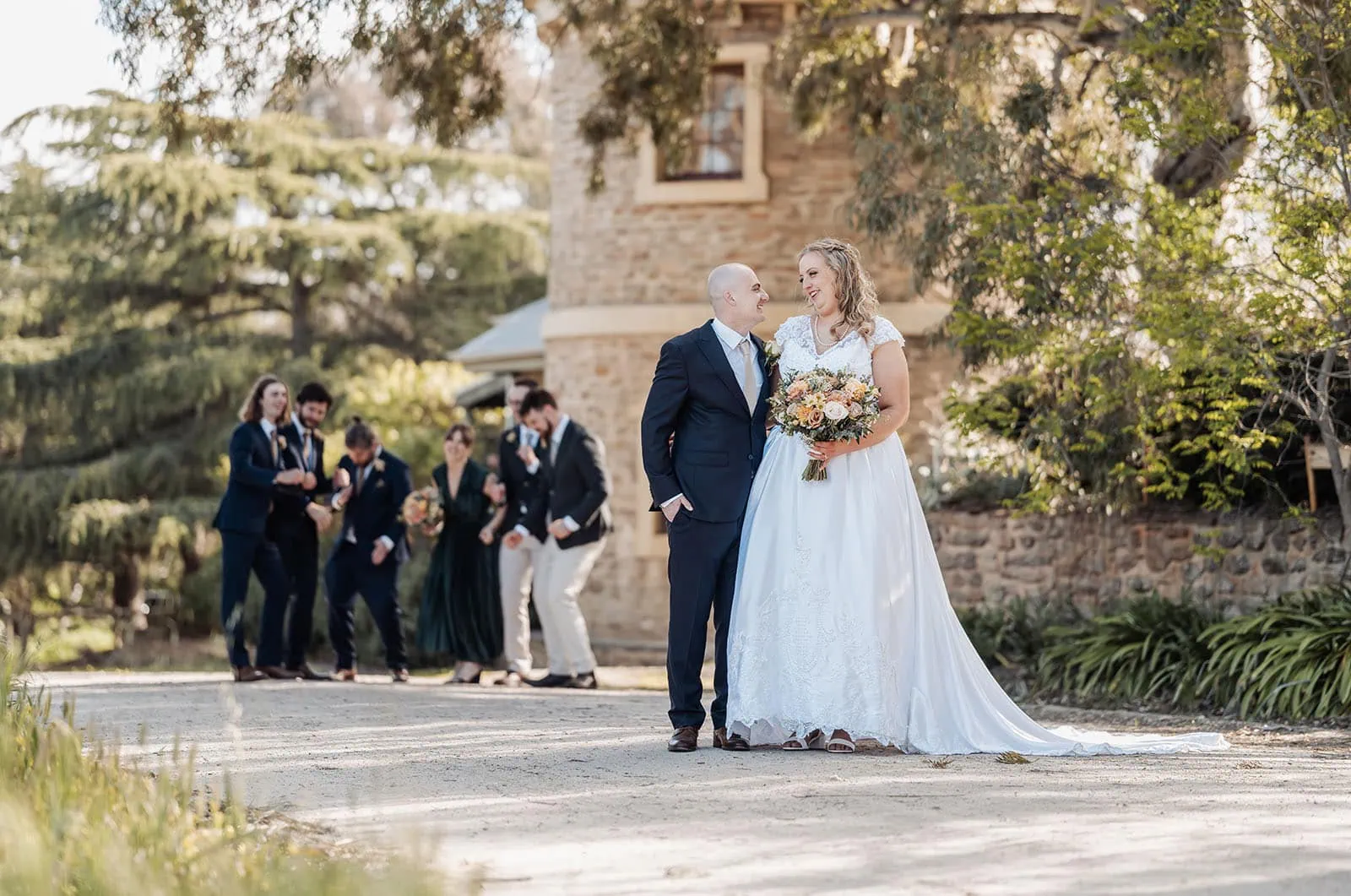 grand cru estate wedding - isabella & nick 137 Bride and groom share a joyful moment at their wedding celebration.