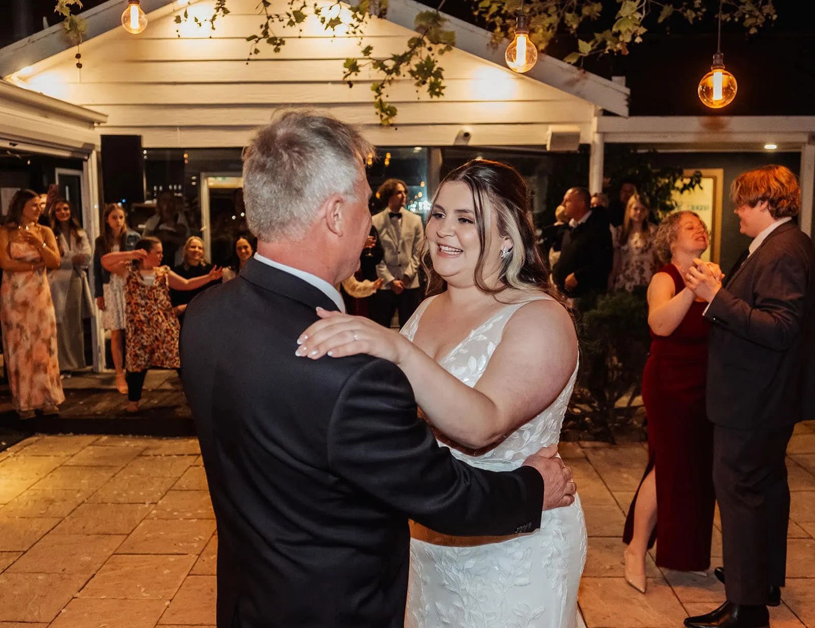 beach rd wines wedding - hana & jessie 97 Lively wedding reception dance with jubilant guests celebrating.