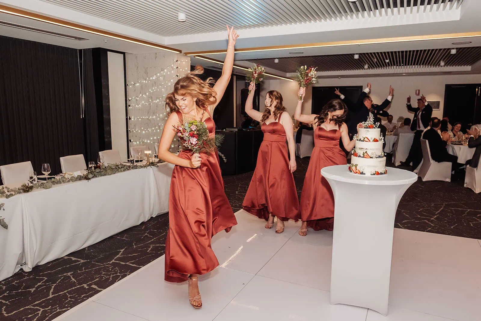 adelaide botanic gardens summerhouse wedding - belinda & ian 201 Elegant bride and groom dancing at vibrant wedding reception celebration.