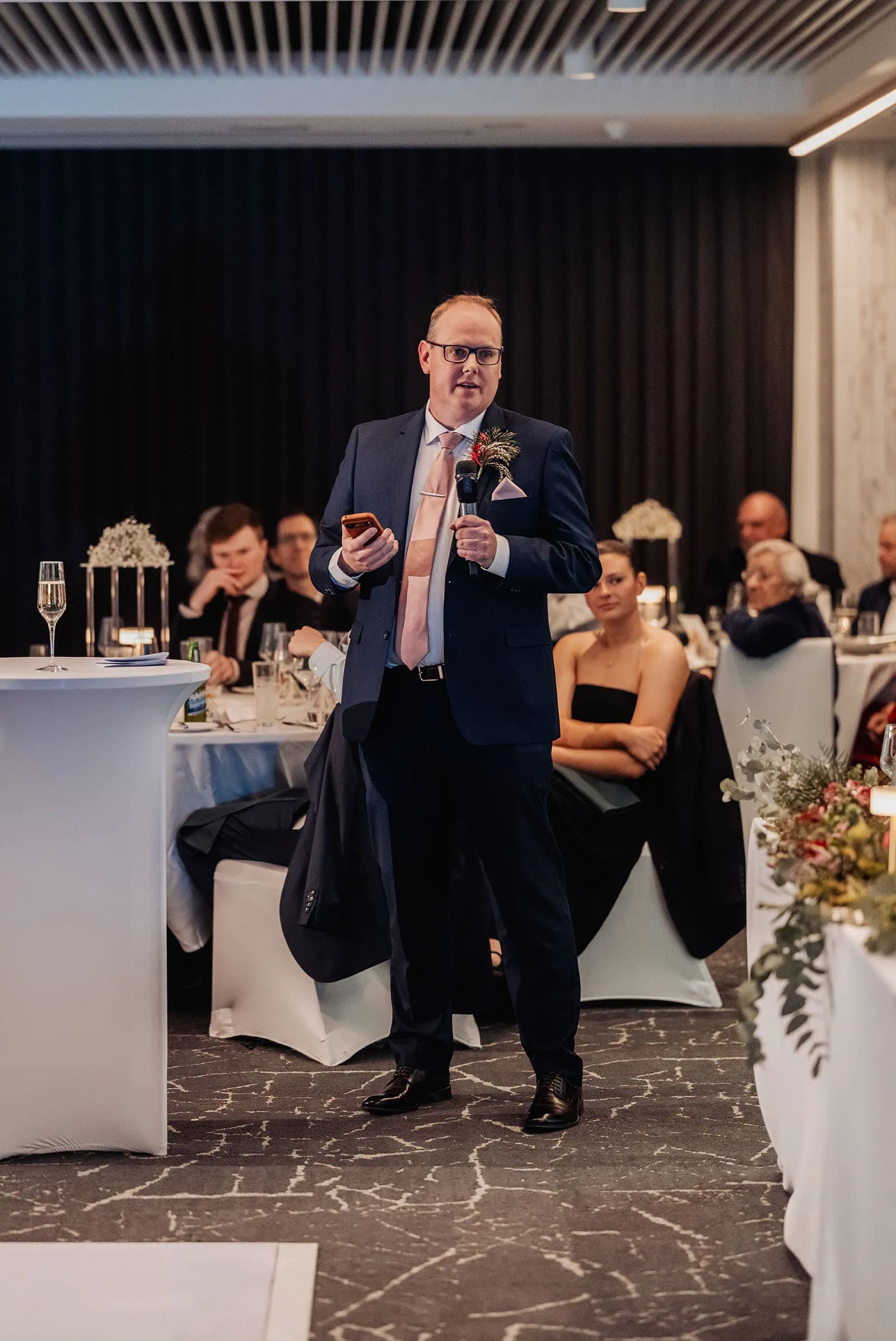 adelaide botanic gardens summerhouse wedding - belinda & ian 203 Wedding guest giving heartfelt toast at elegant reception.
