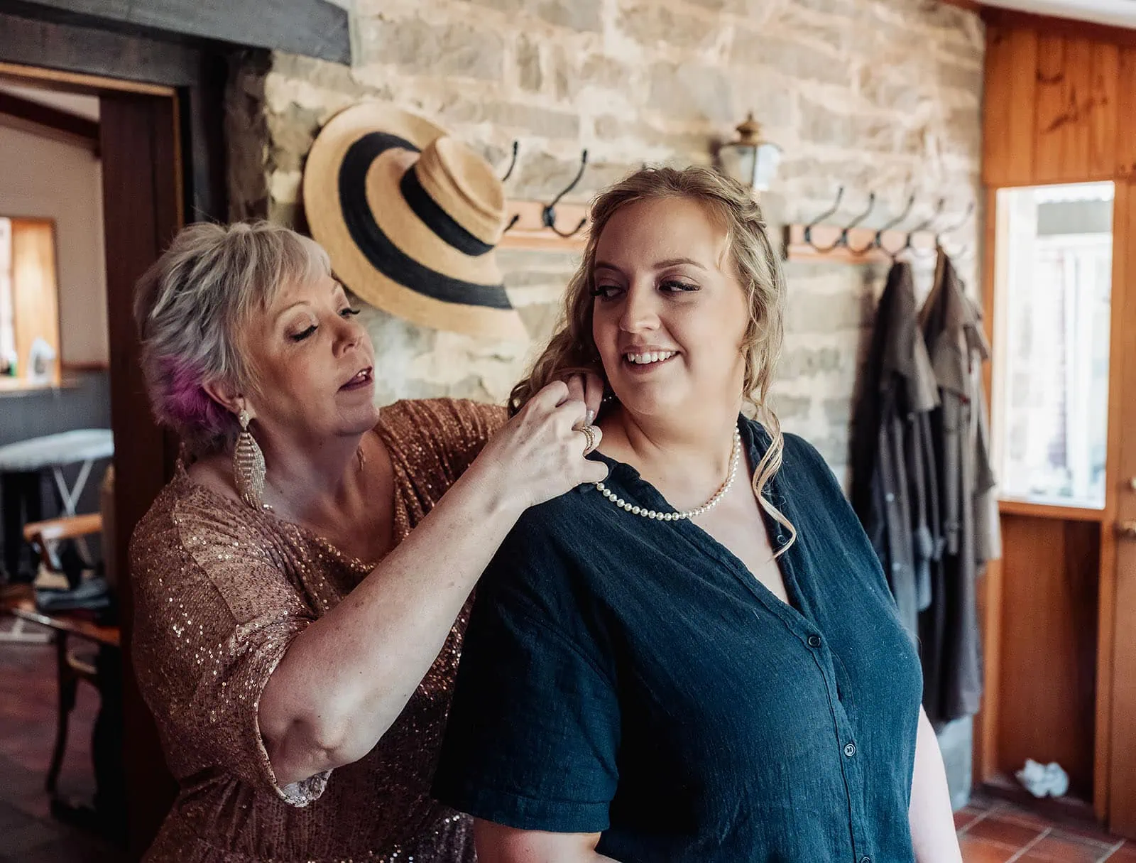 grand cru estate wedding - isabella & nick 108 Women crafting elegant jewelry with precision and care.