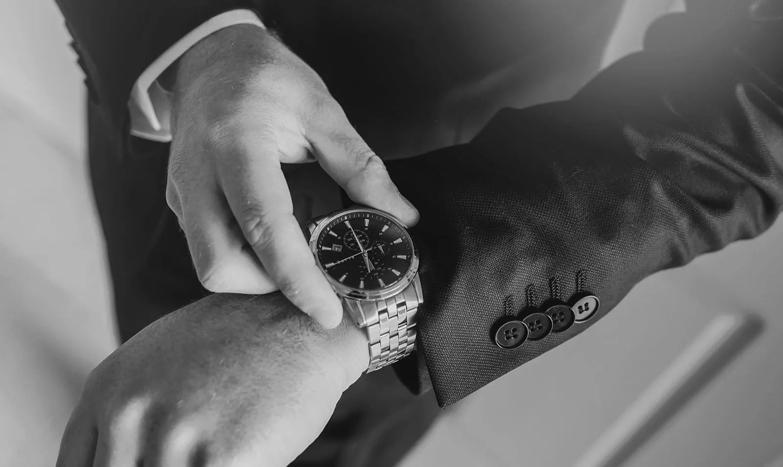 grand cru estate wedding - isabella & nick 102 Elegant wristwatch with leather strap showcasing timeless luxury and style.