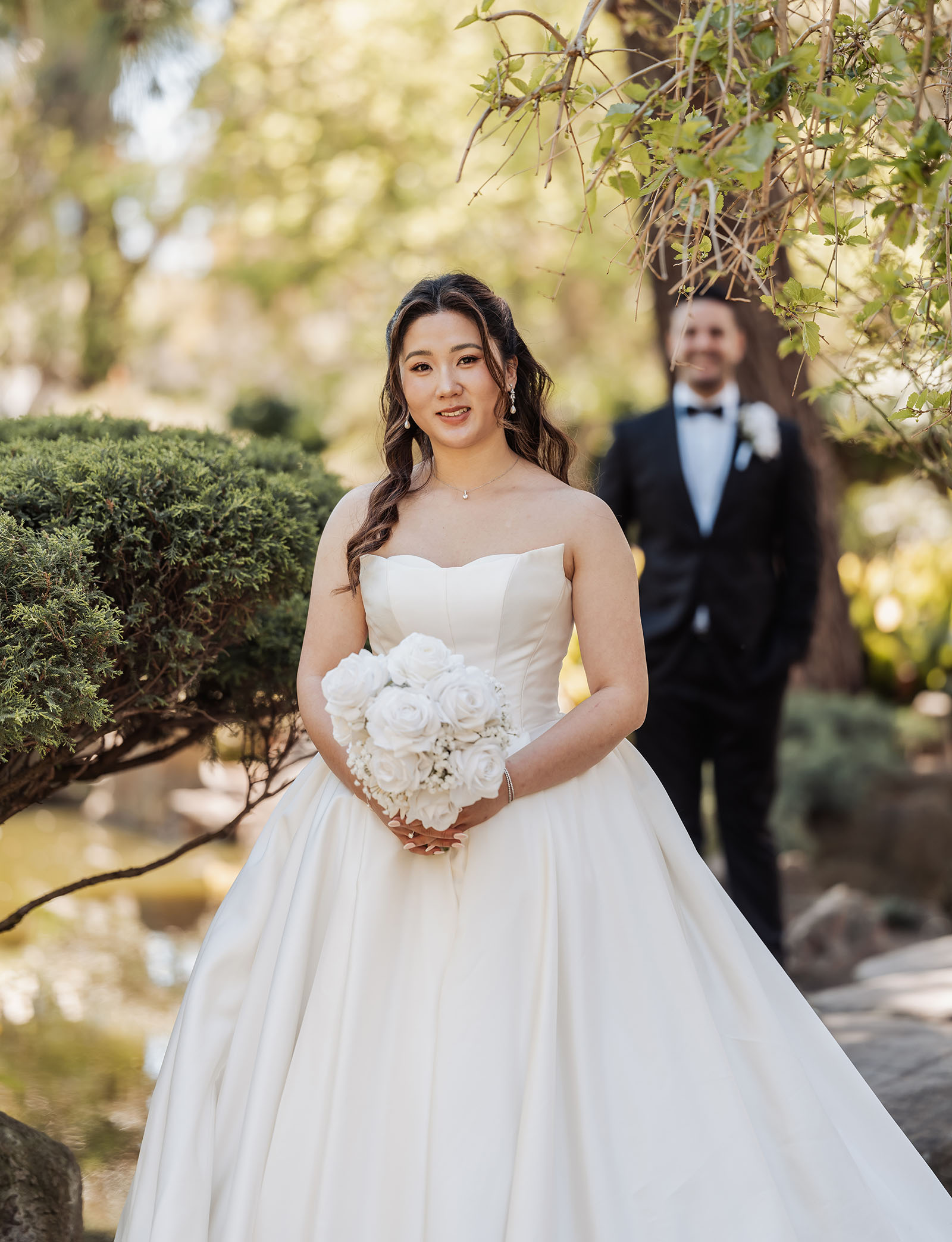 sunnybrae rose garden wedding - celina & anuj 26 Outdoor wedding ceremony with bride and groom exchanging vows.