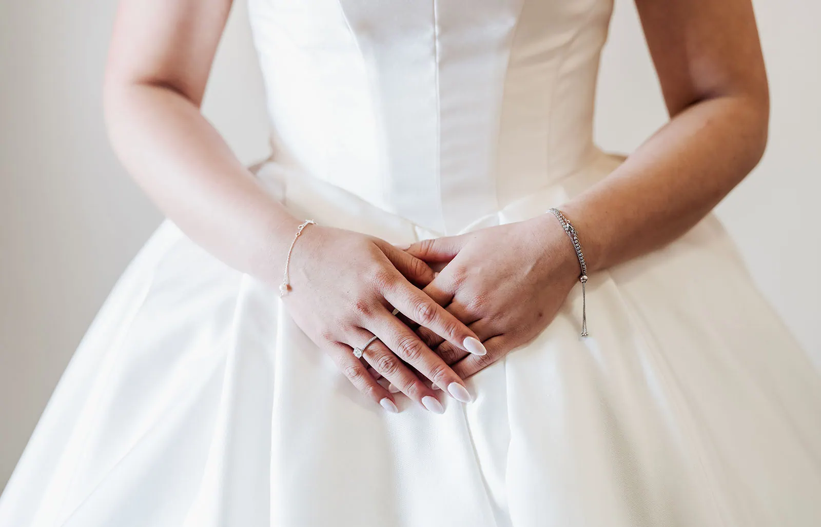 sunnybrae rose garden wedding - celina & anuj 10 Bride’s hands with elegant rings and a delicate bouquet.